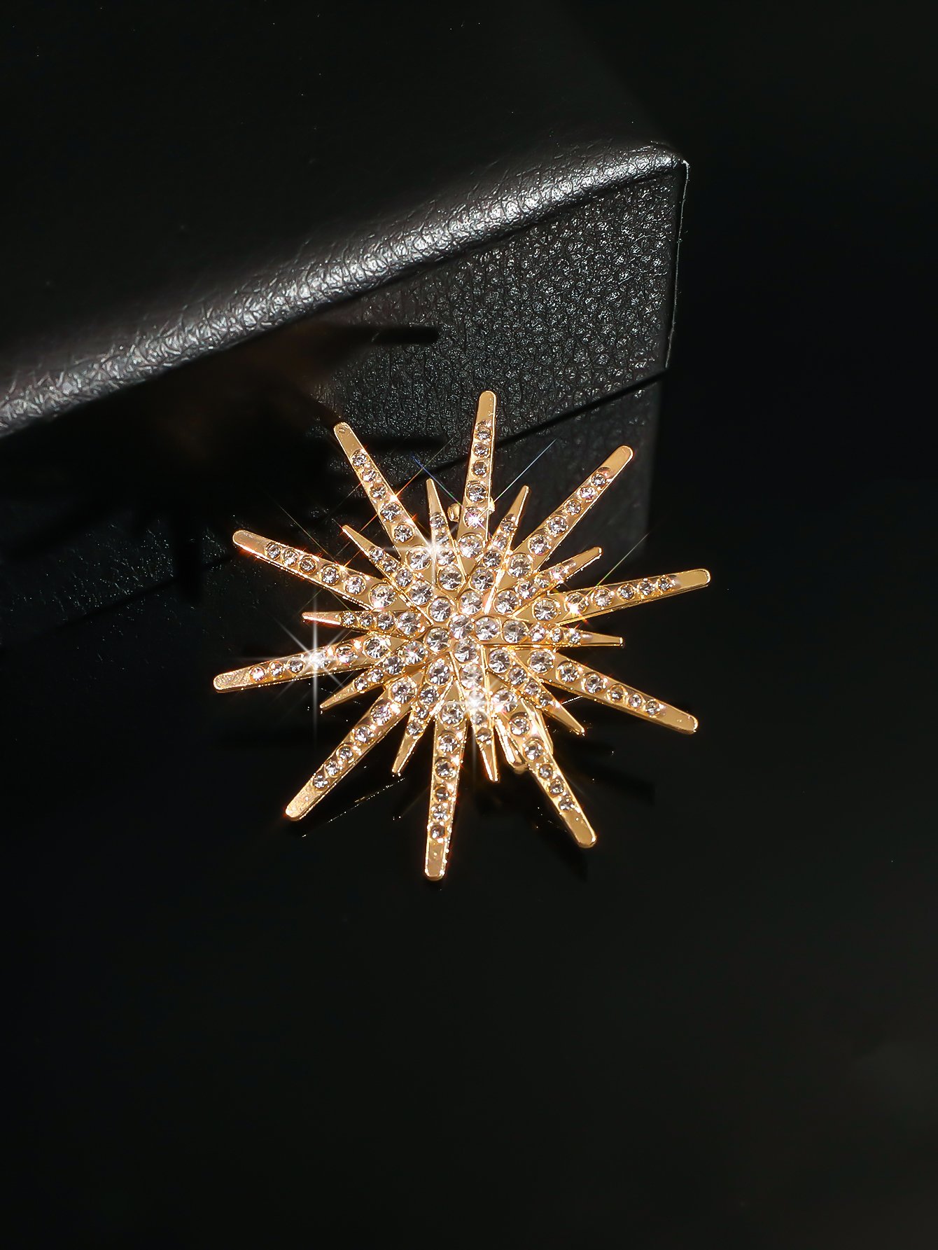 Radiant Gold Starburst Brooch