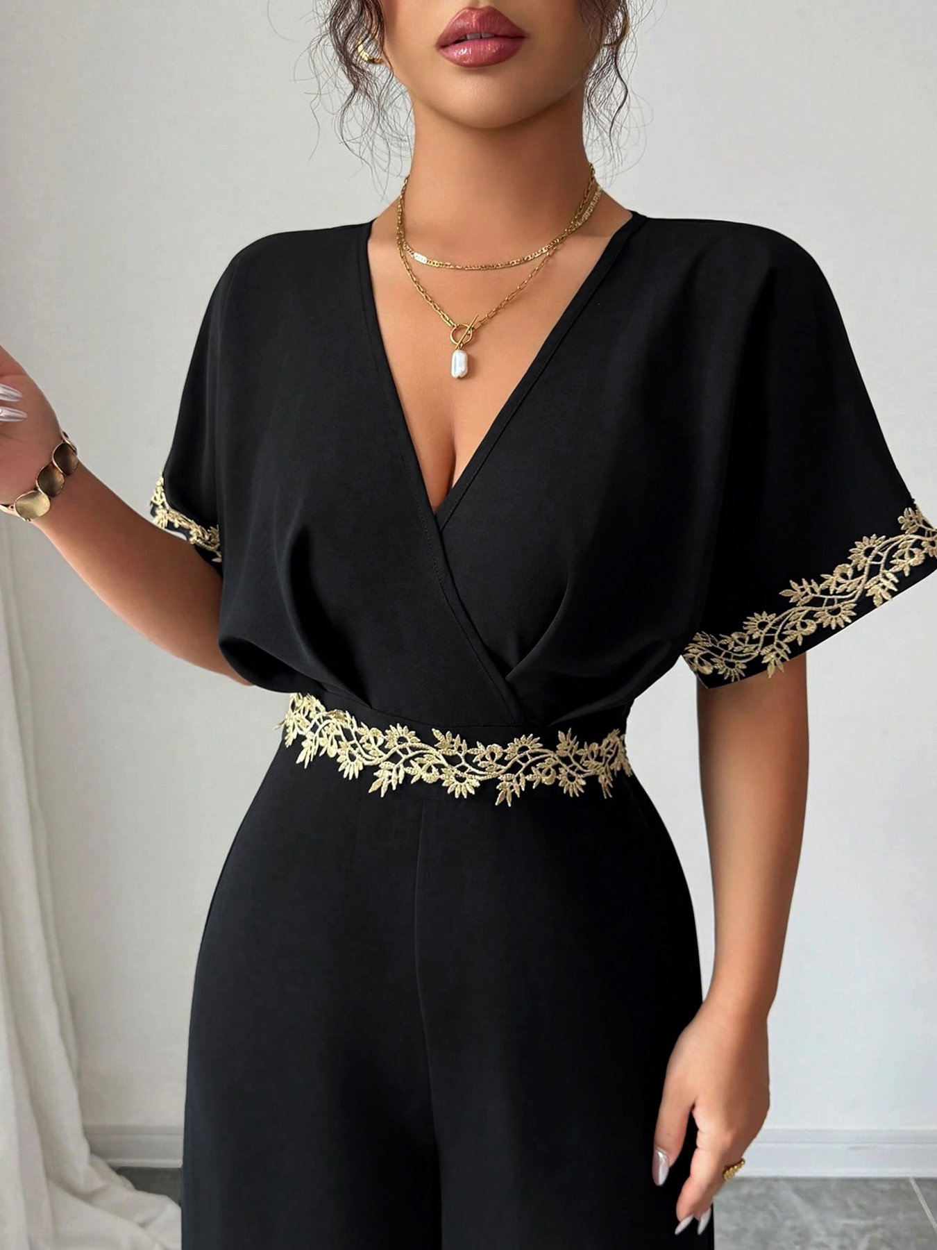 Elegant Black Wide-Leg Jumpsuit with Gold Embroidery
