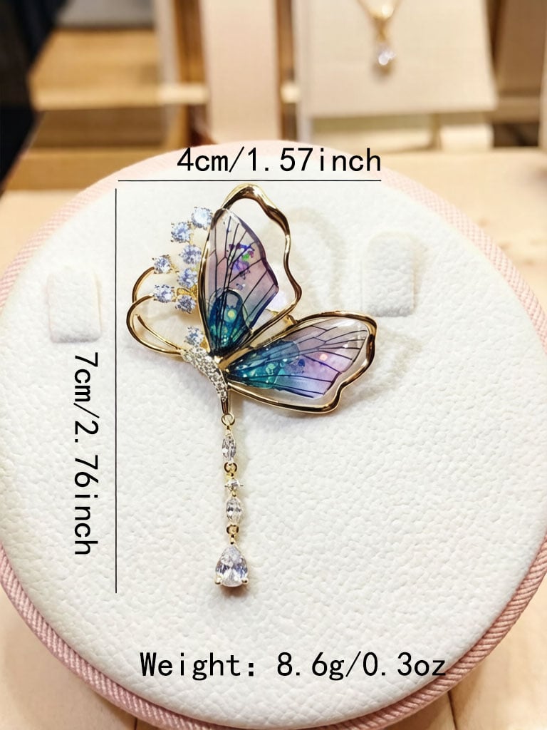 Golden Butterfly Dangle Brooch with Crystal Teardrop
