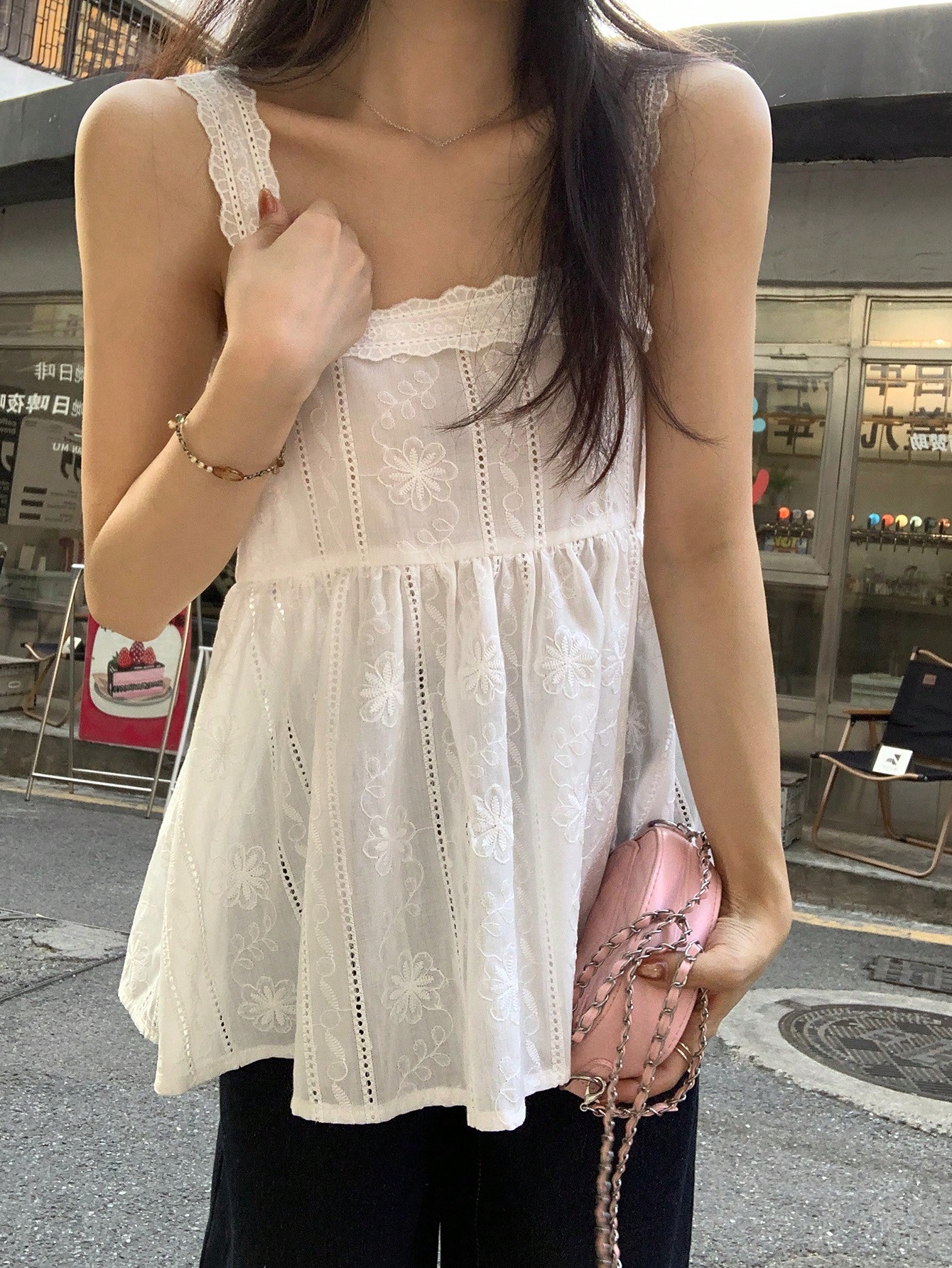 White Embroidered Peplum Sleeveless Top