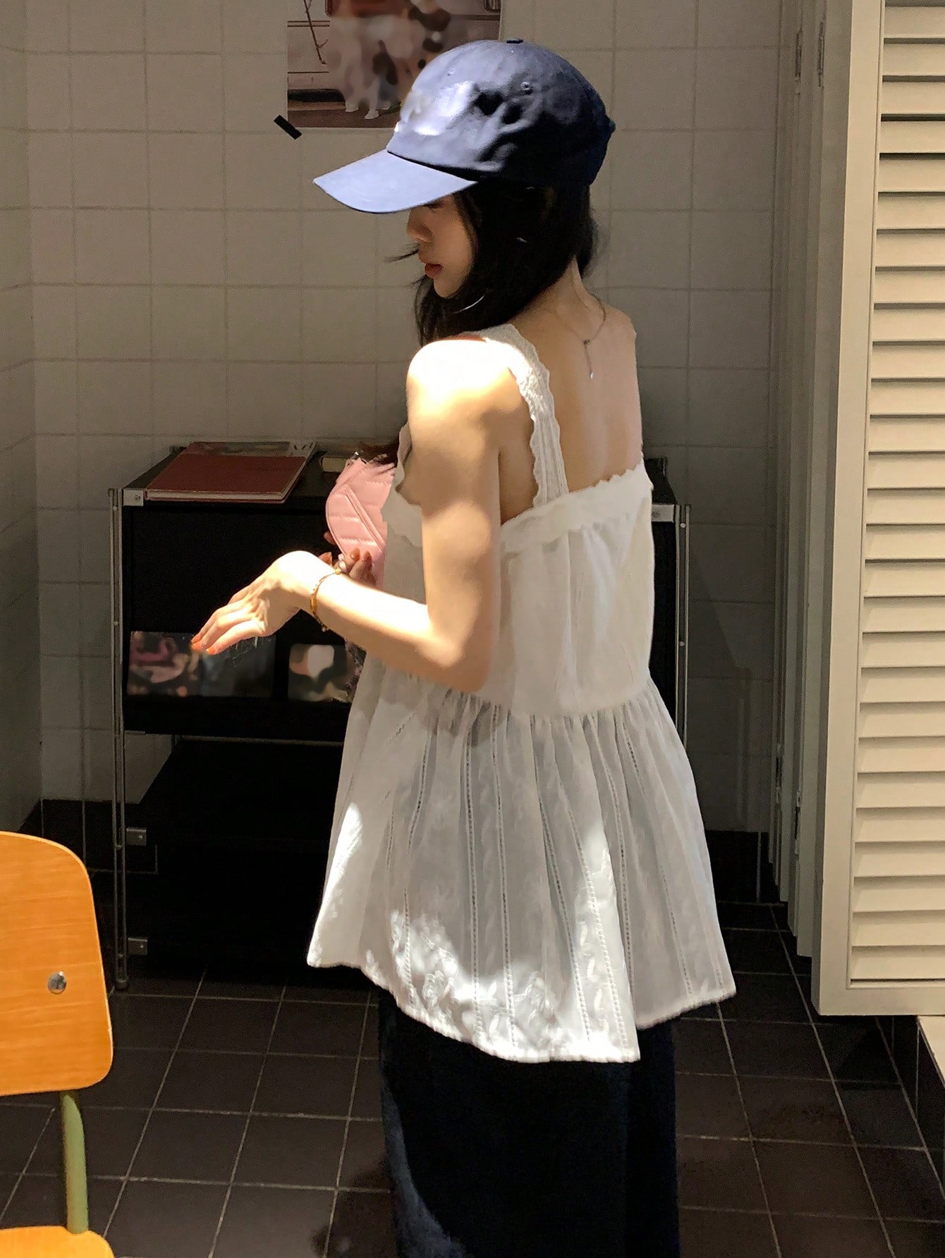 White Embroidered Peplum Sleeveless Top