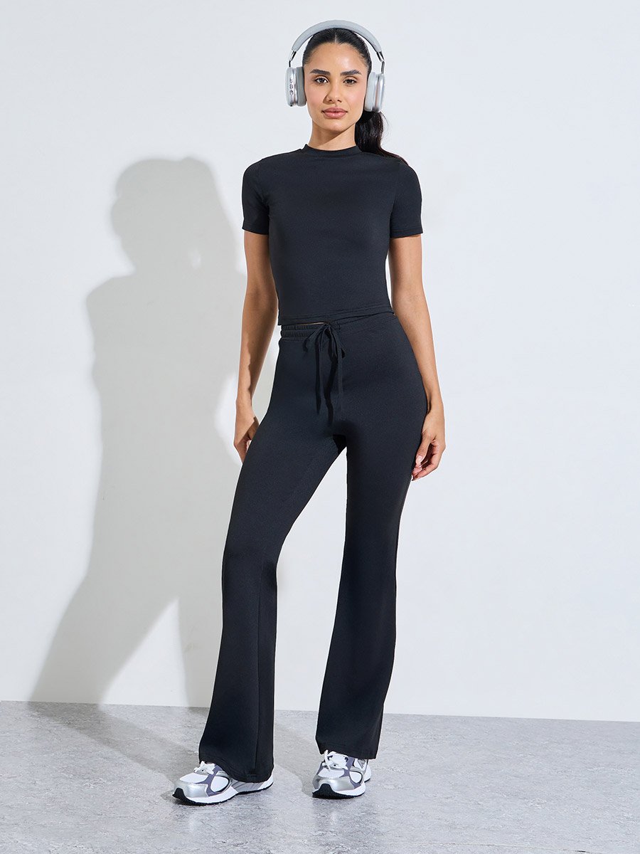 Black Solid Fitted T-Shirt and Flared Pants Active Set