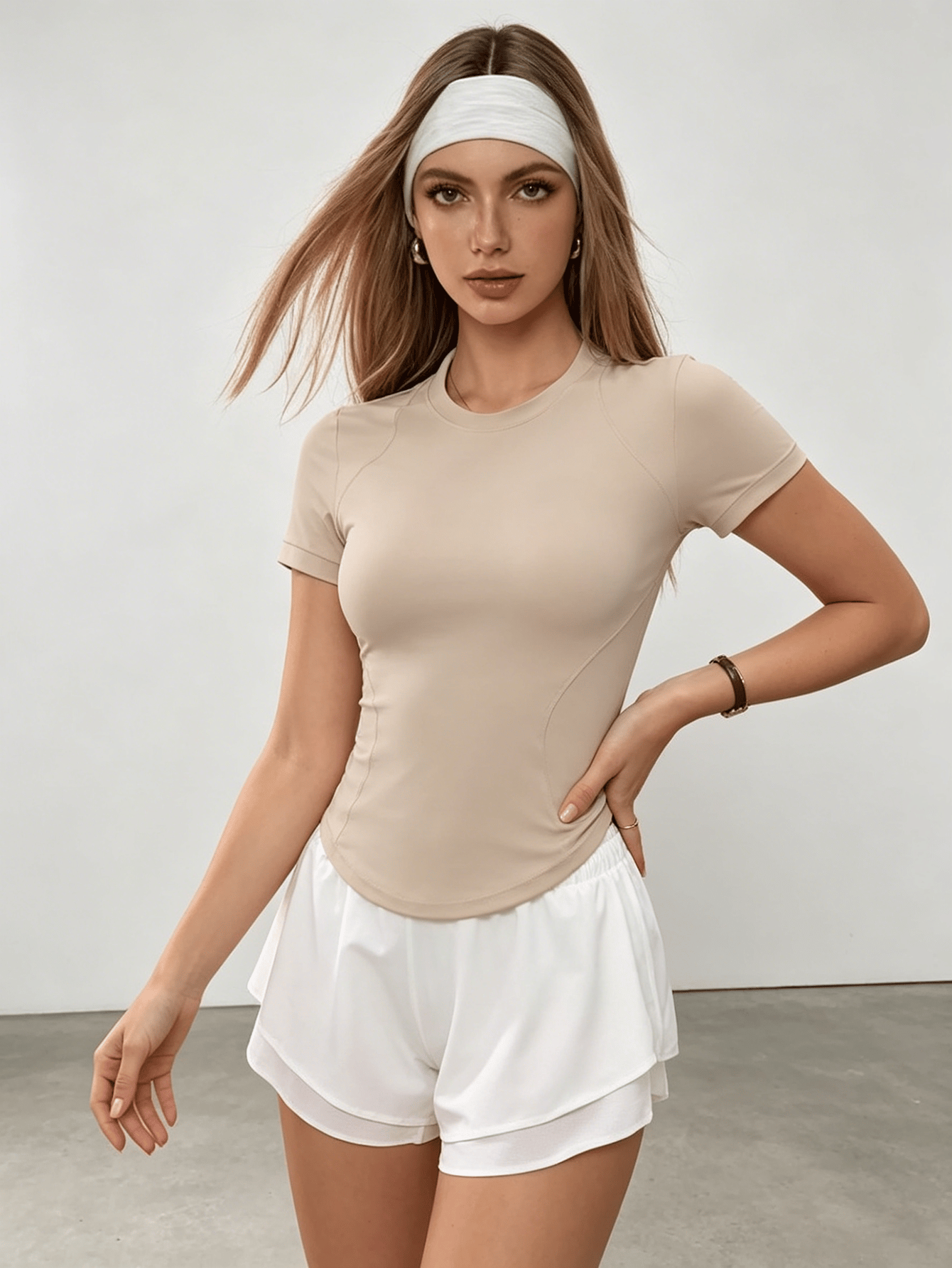 Nude Form-Fitting Tennis Top and Layered Shorts Set