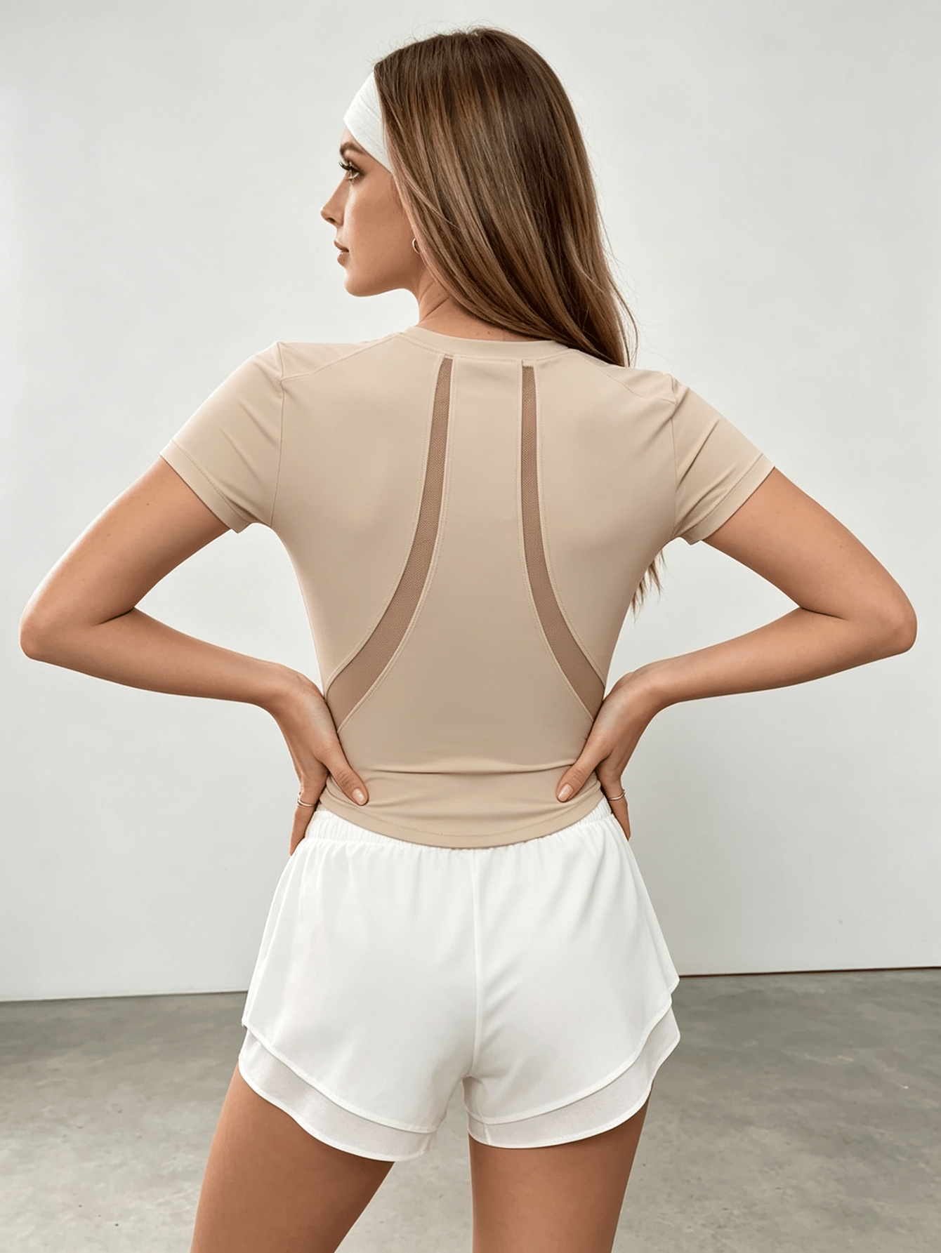 Nude Form-Fitting Tennis Top and Layered Shorts Set