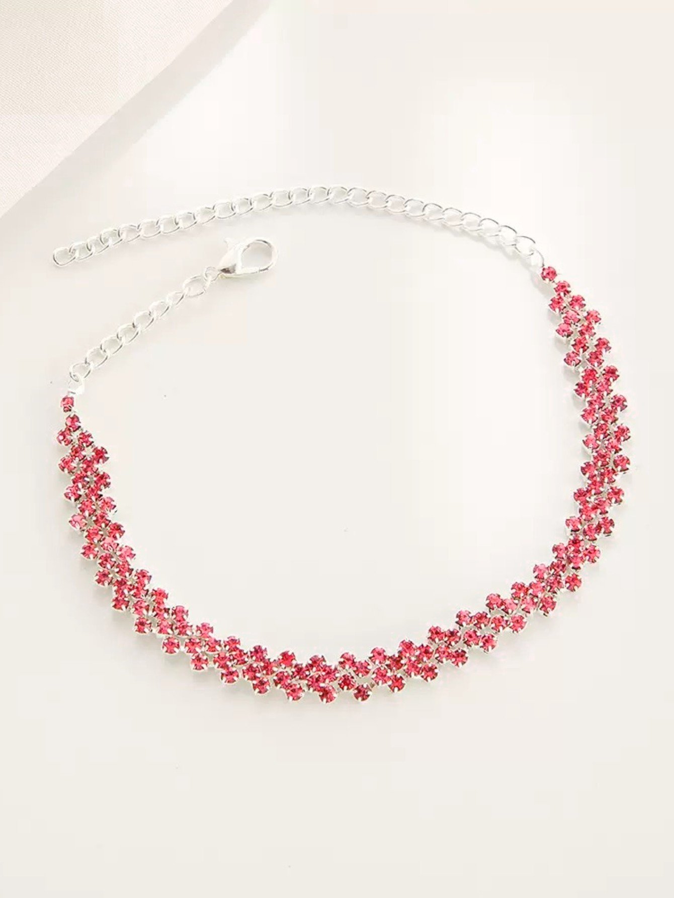 Pink Rhinestone Link Bracelet for Festive Occasions.