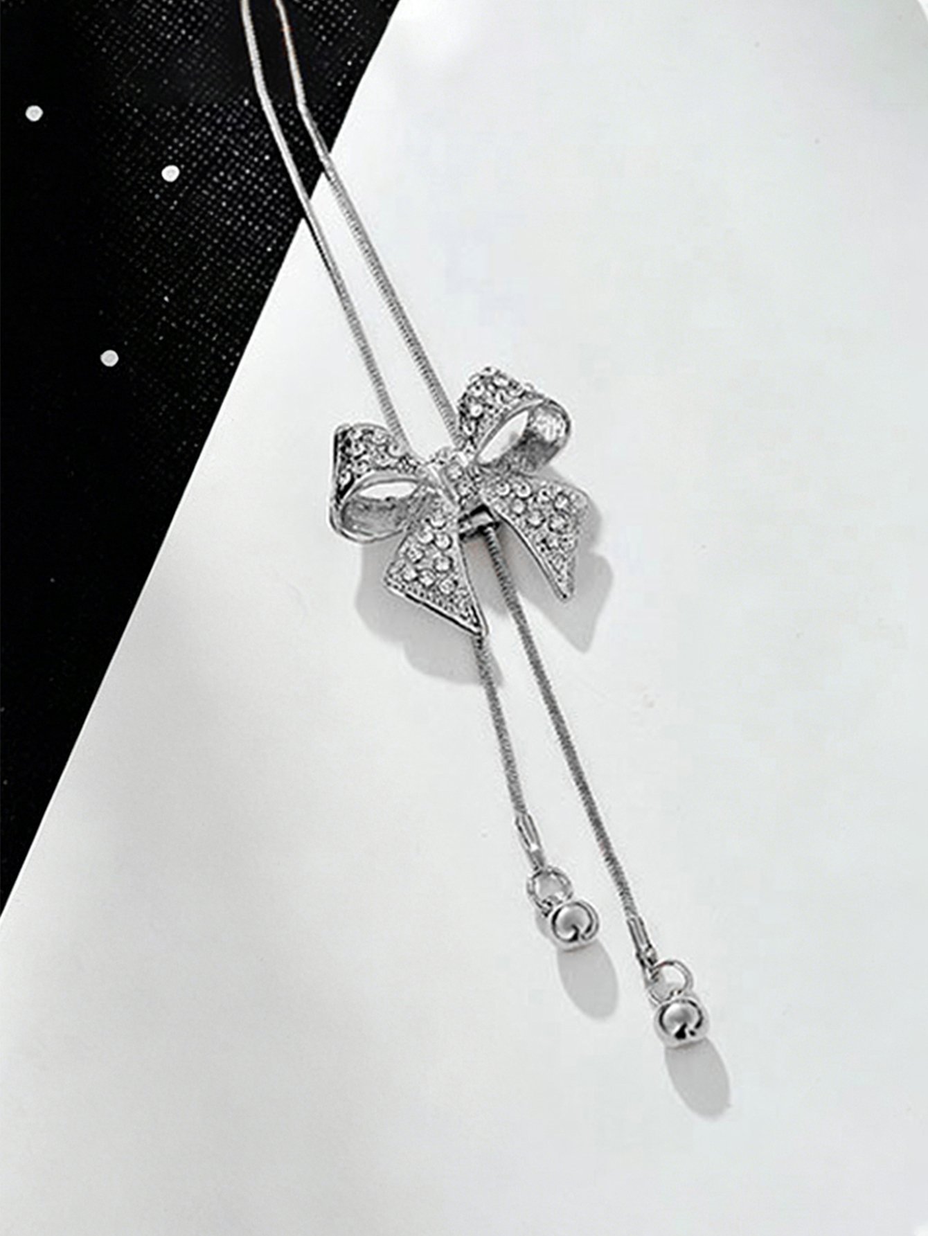 Silver Bow Pendant Necklace