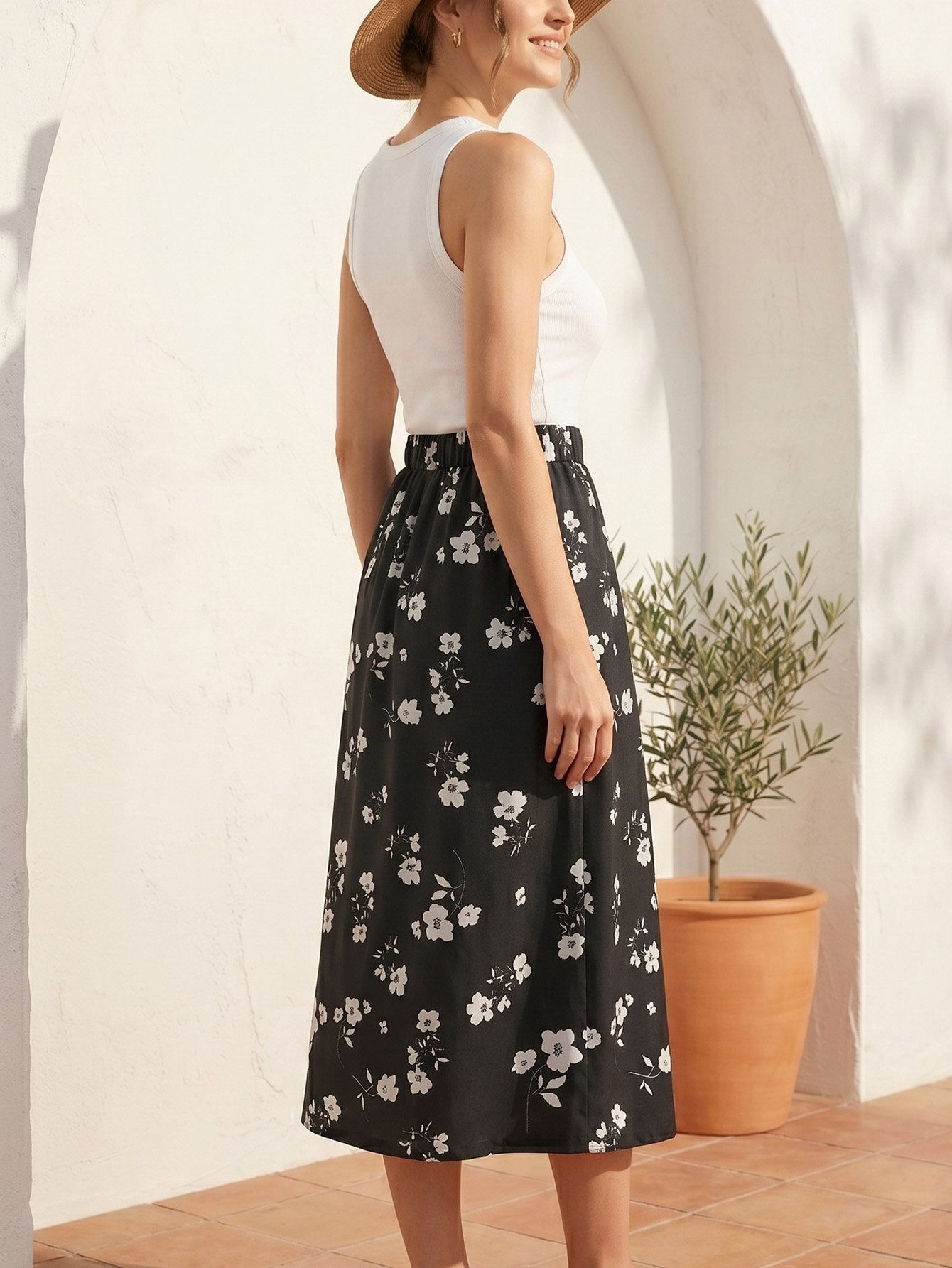 Elegant Black Floral Midi Skirt - Flared and High-Waisted for Summer