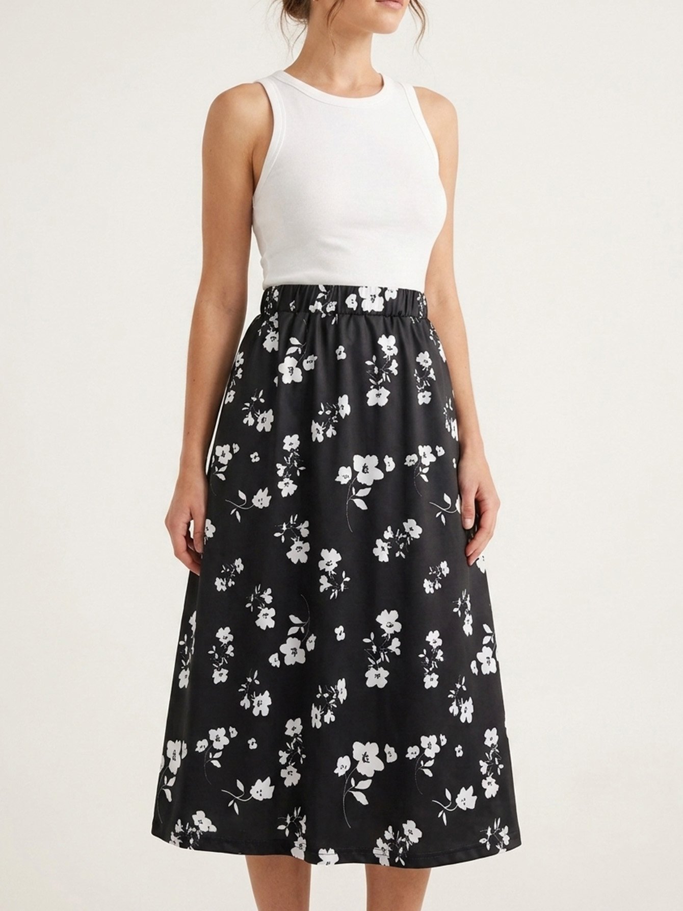 Elegant Black Floral Midi Skirt - Flared and High-Waisted for Summer