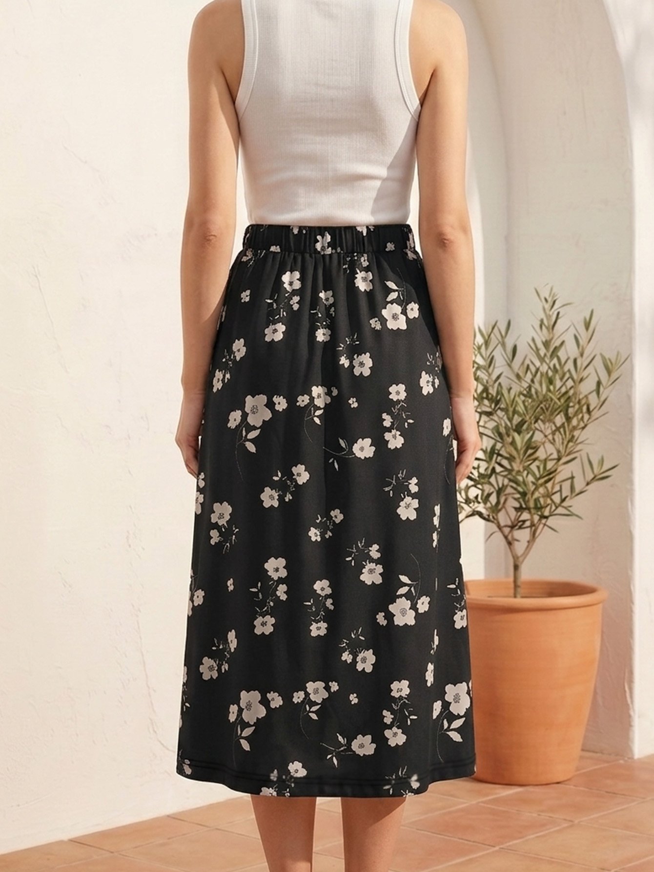 Elegant Black Floral Midi Skirt - Flared and High-Waisted for Summer