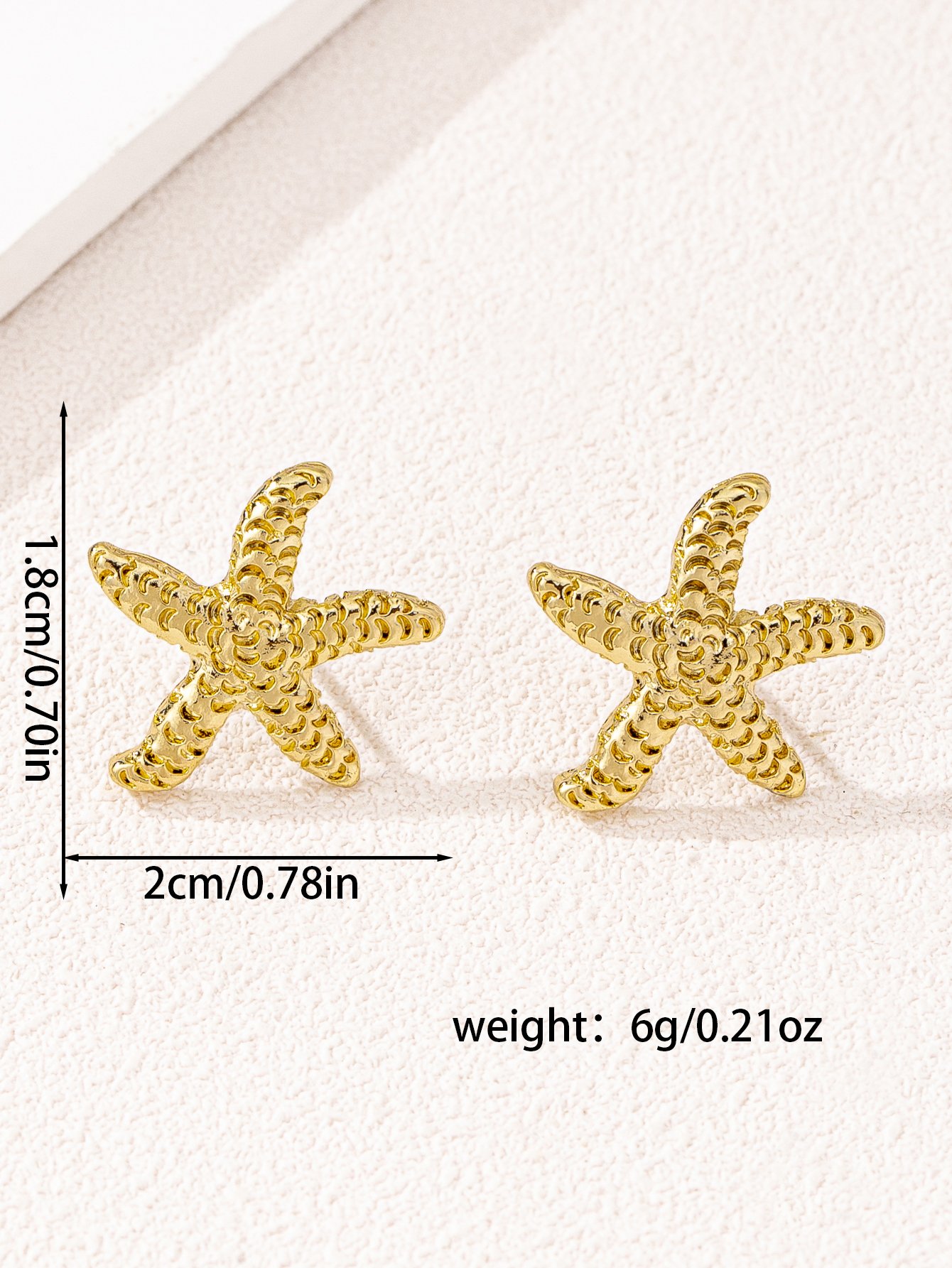 Gold Starfish Stud Earrings for Casual Wear.