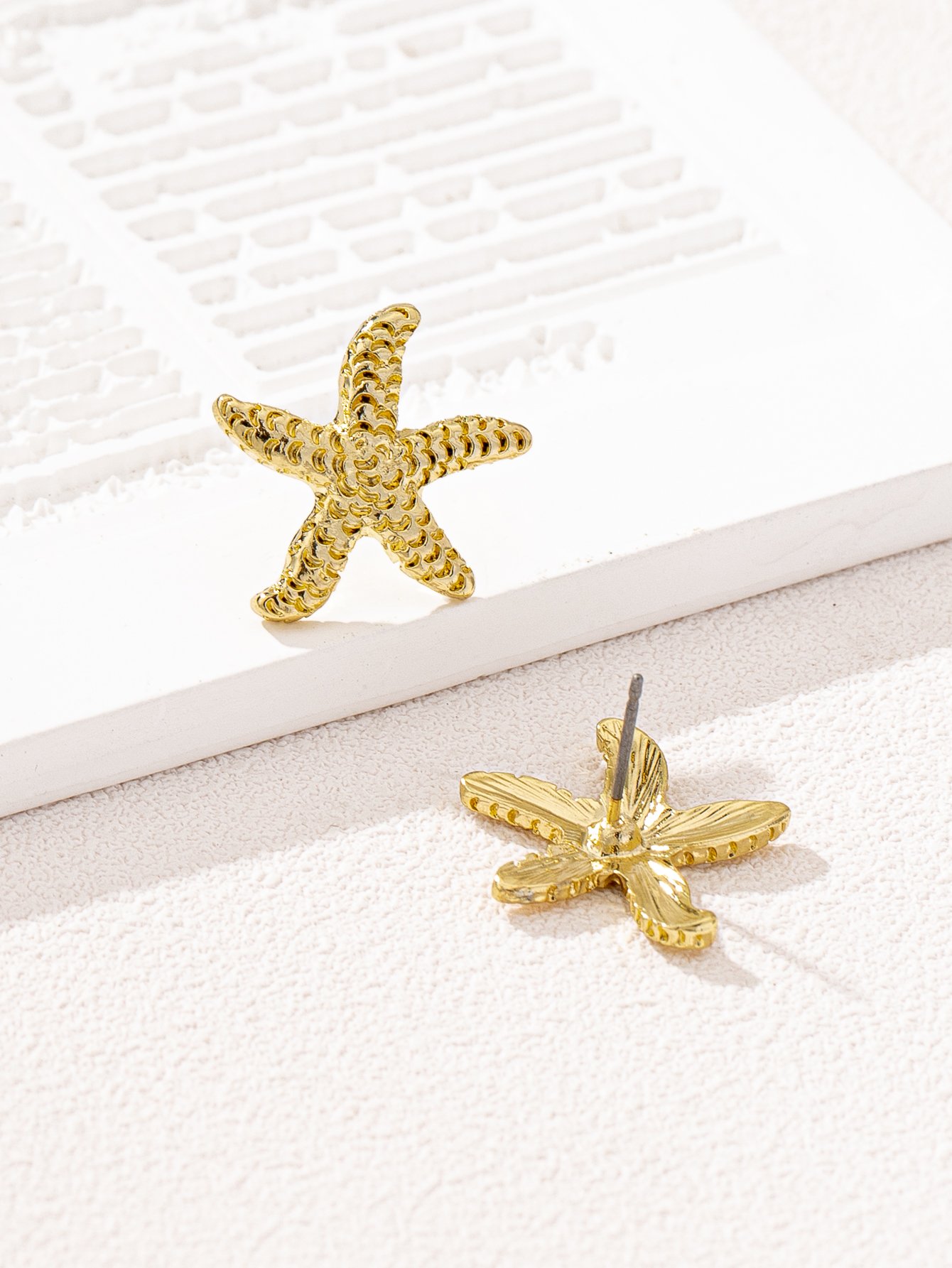 Gold Starfish Stud Earrings for Casual Wear.