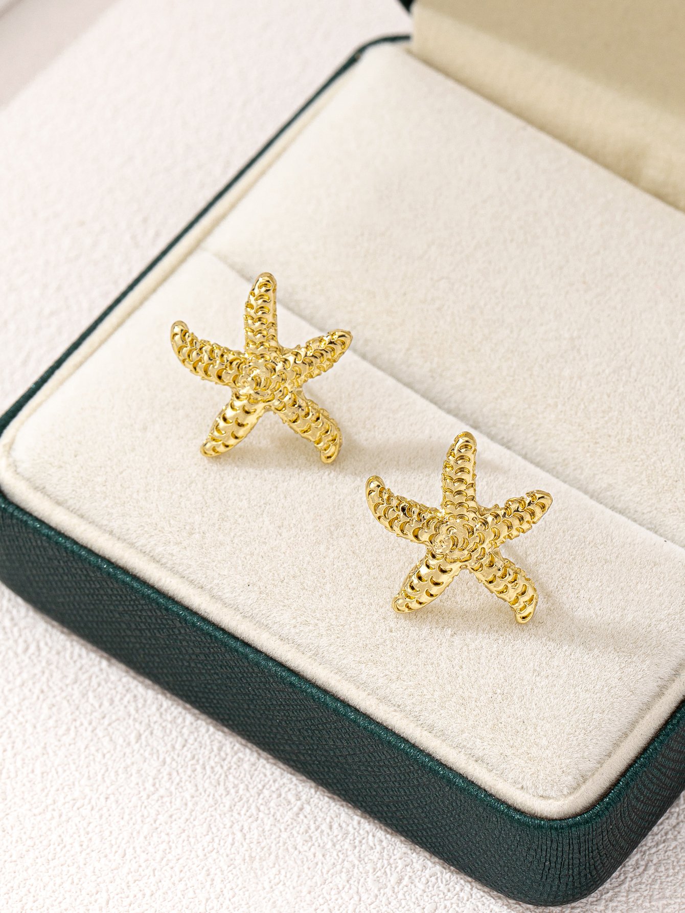 Gold Starfish Stud Earrings for Casual Wear.