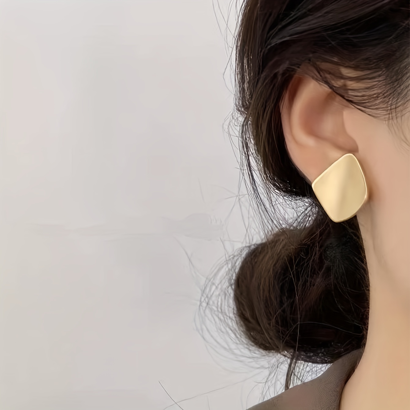 Gold Geometric Stud Earrings - Trendy and Casual Wear.