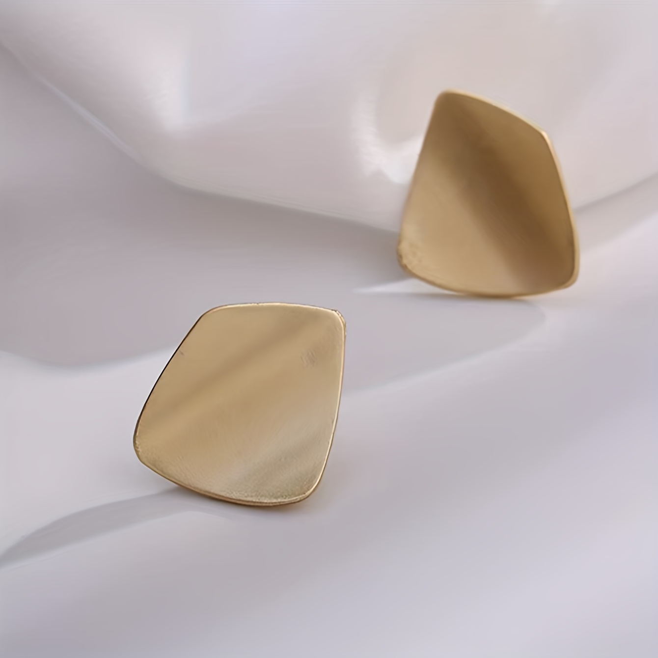 Gold Geometric Stud Earrings - Trendy and Casual Wear.