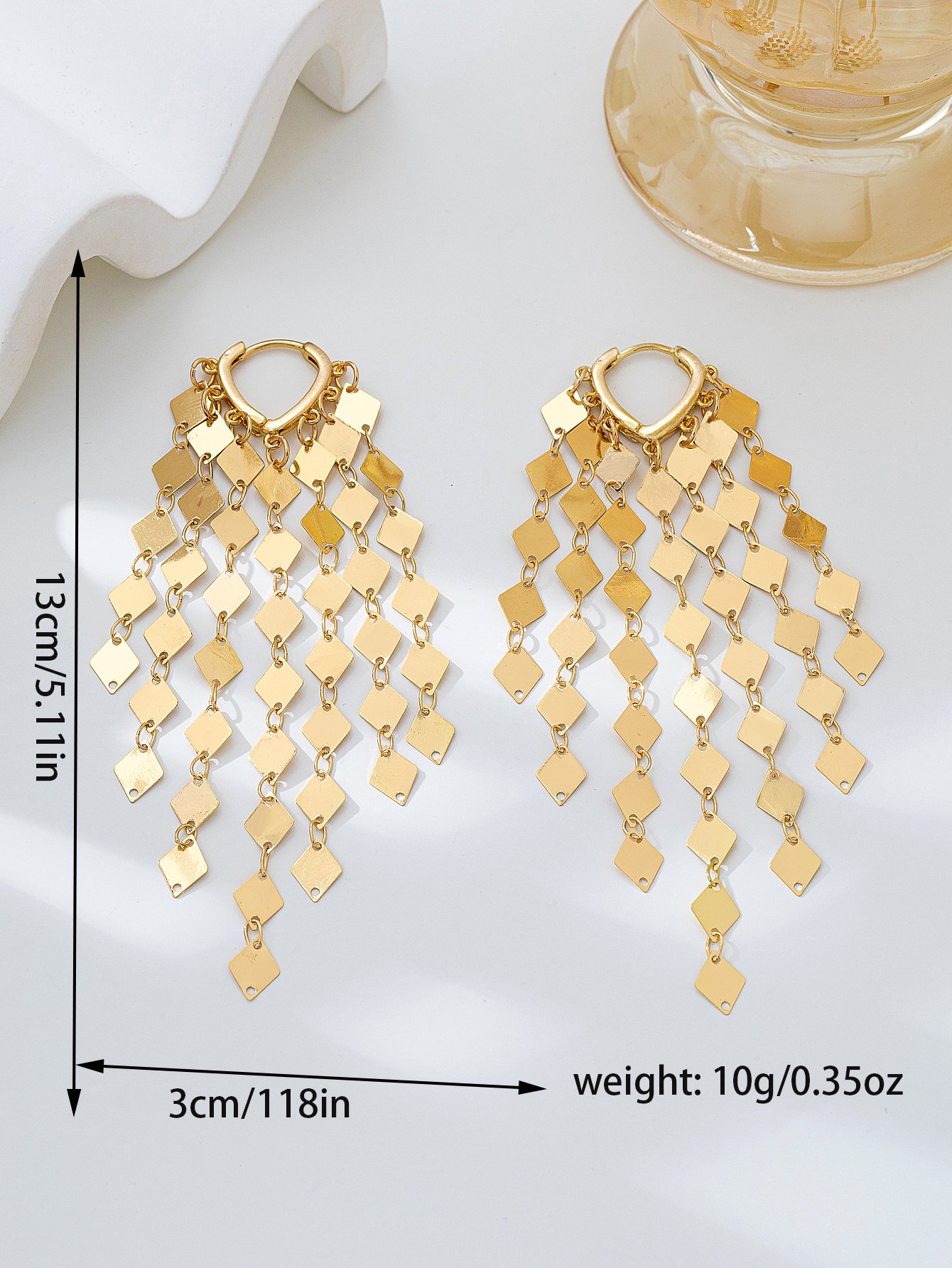 Gold Diamond-Shaped Dangle Earrings for Casual Wear.