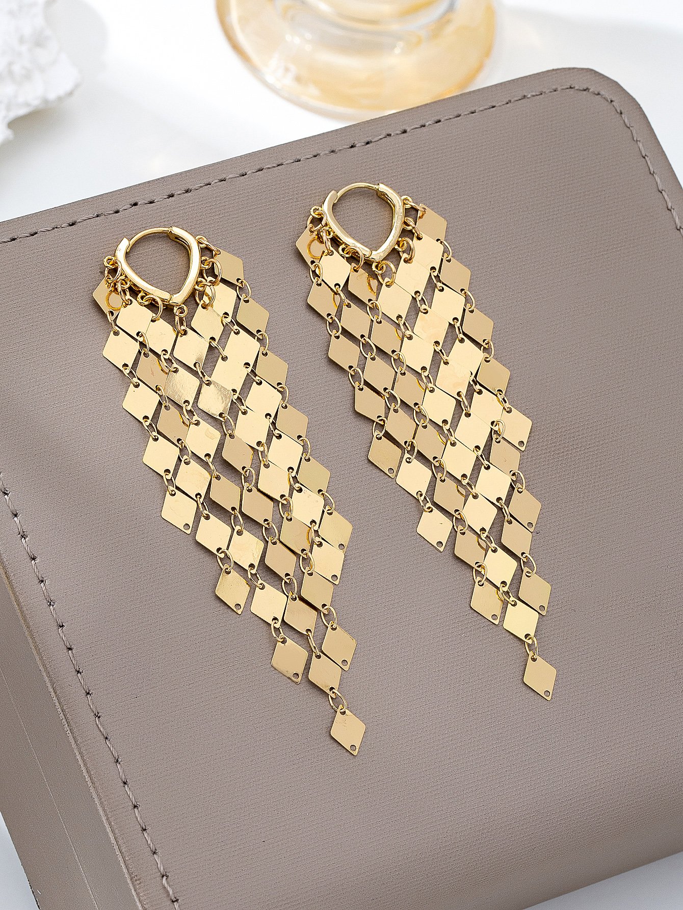 Gold Diamond-Shaped Dangle Earrings for Casual Wear.