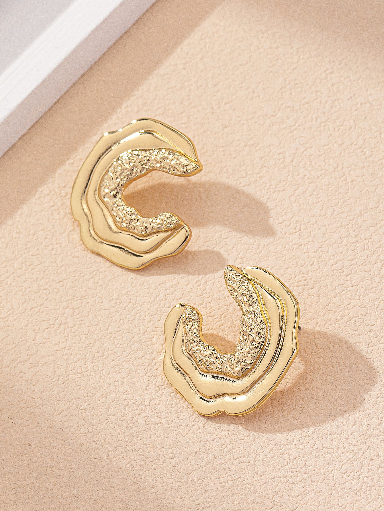Gold Geometric Stud Earrings for Everyday Wear.