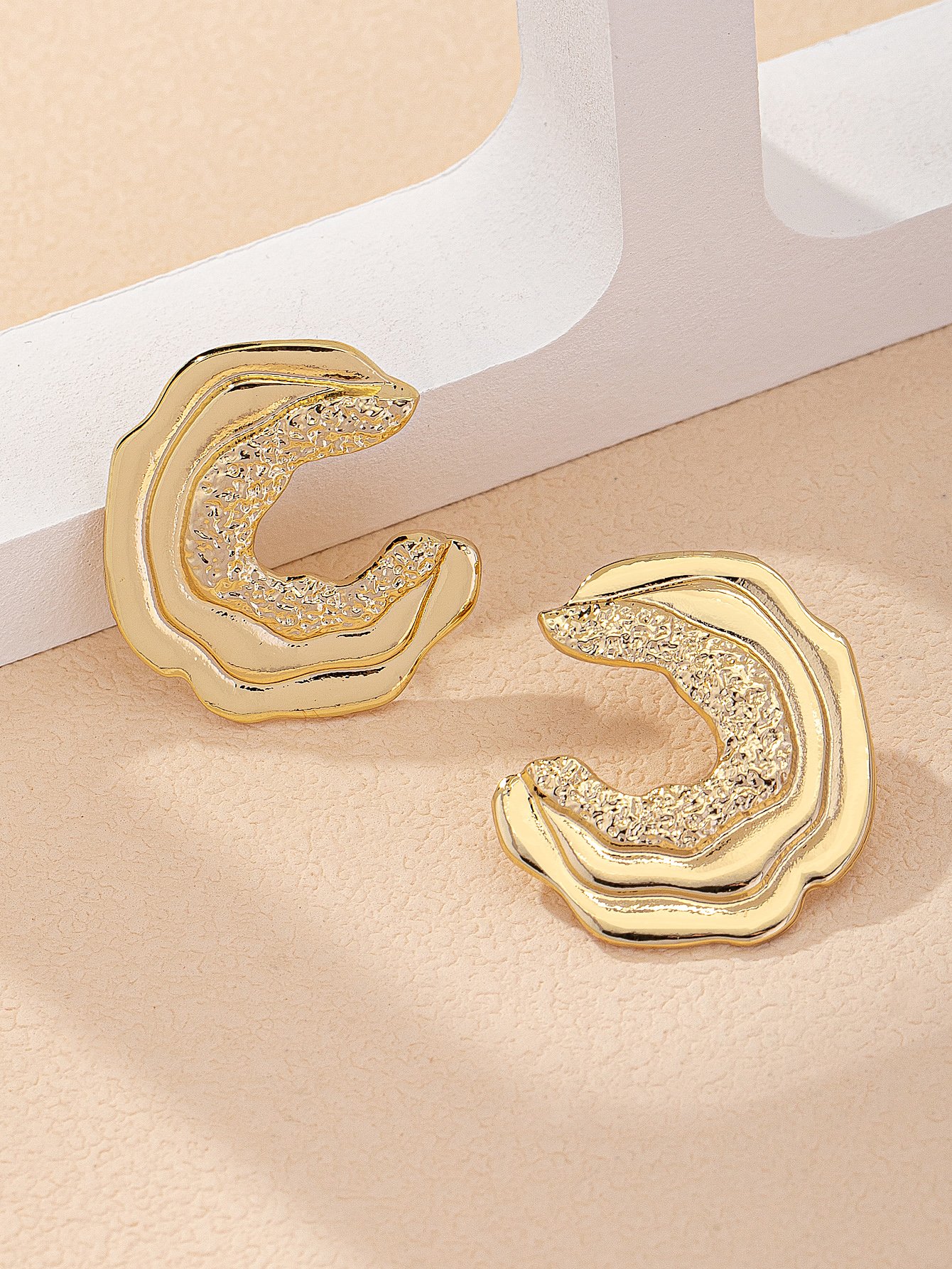 Gold Geometric Stud Earrings for Everyday Wear.