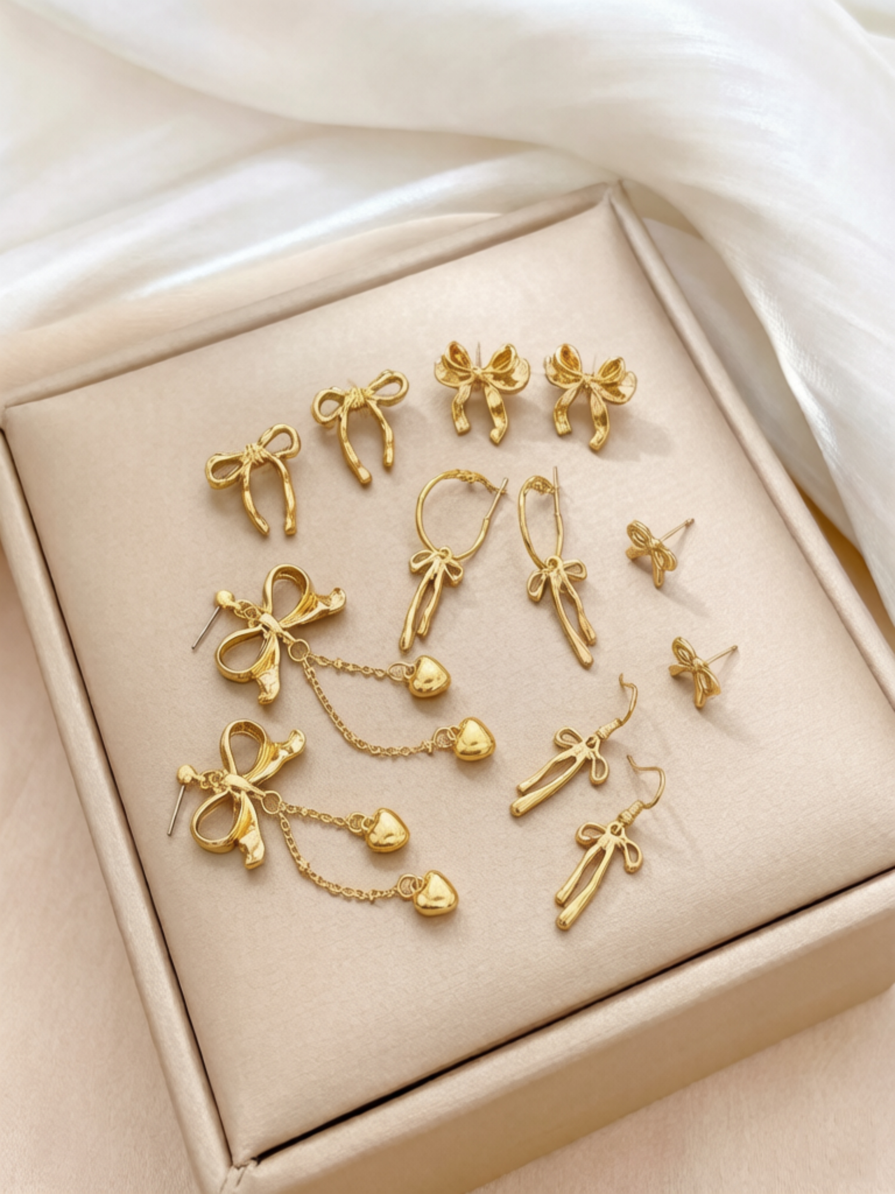 Gold Bow Earring Set for Casual Wear.
