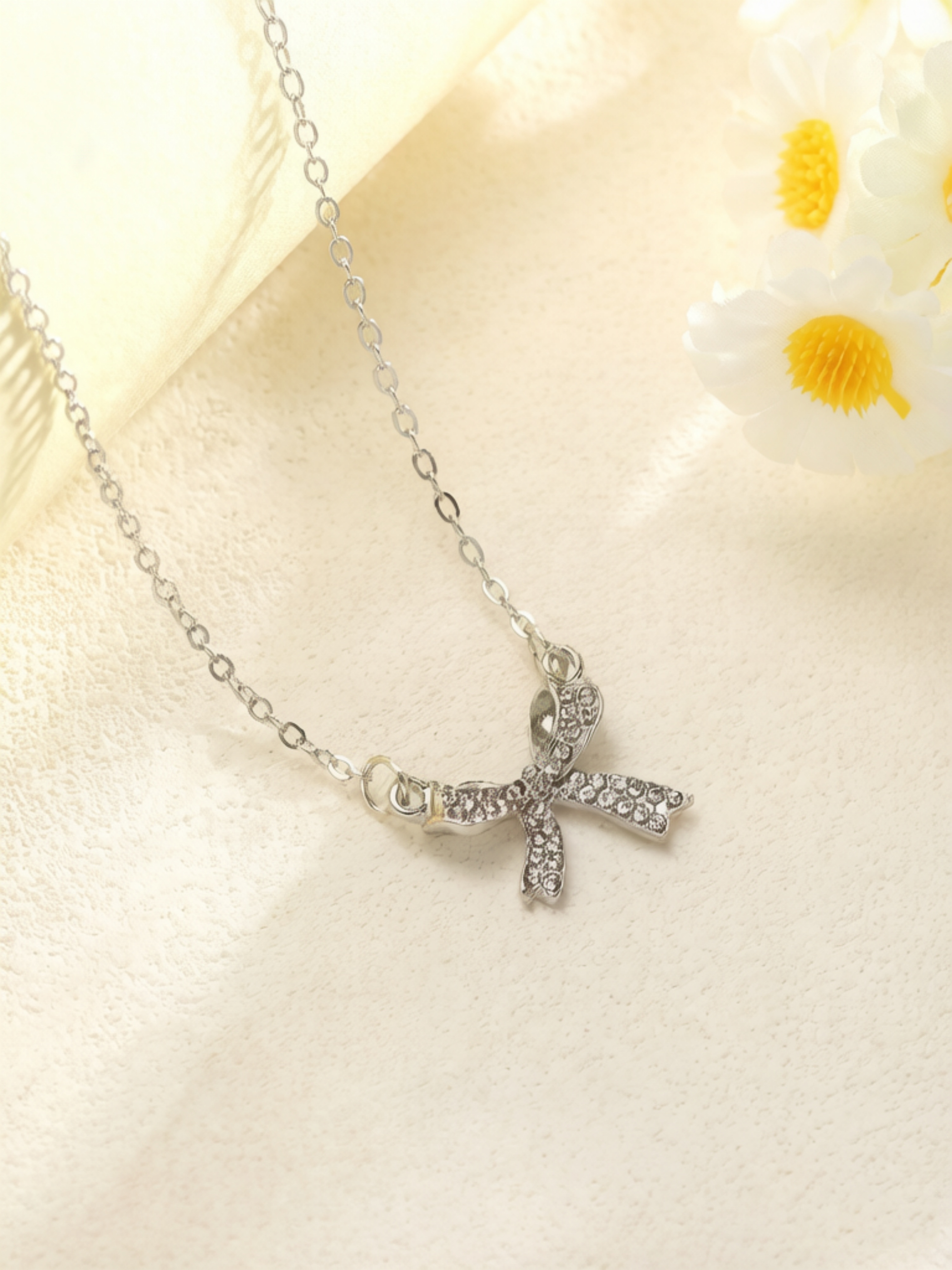 Silver Bow Pendant Necklace