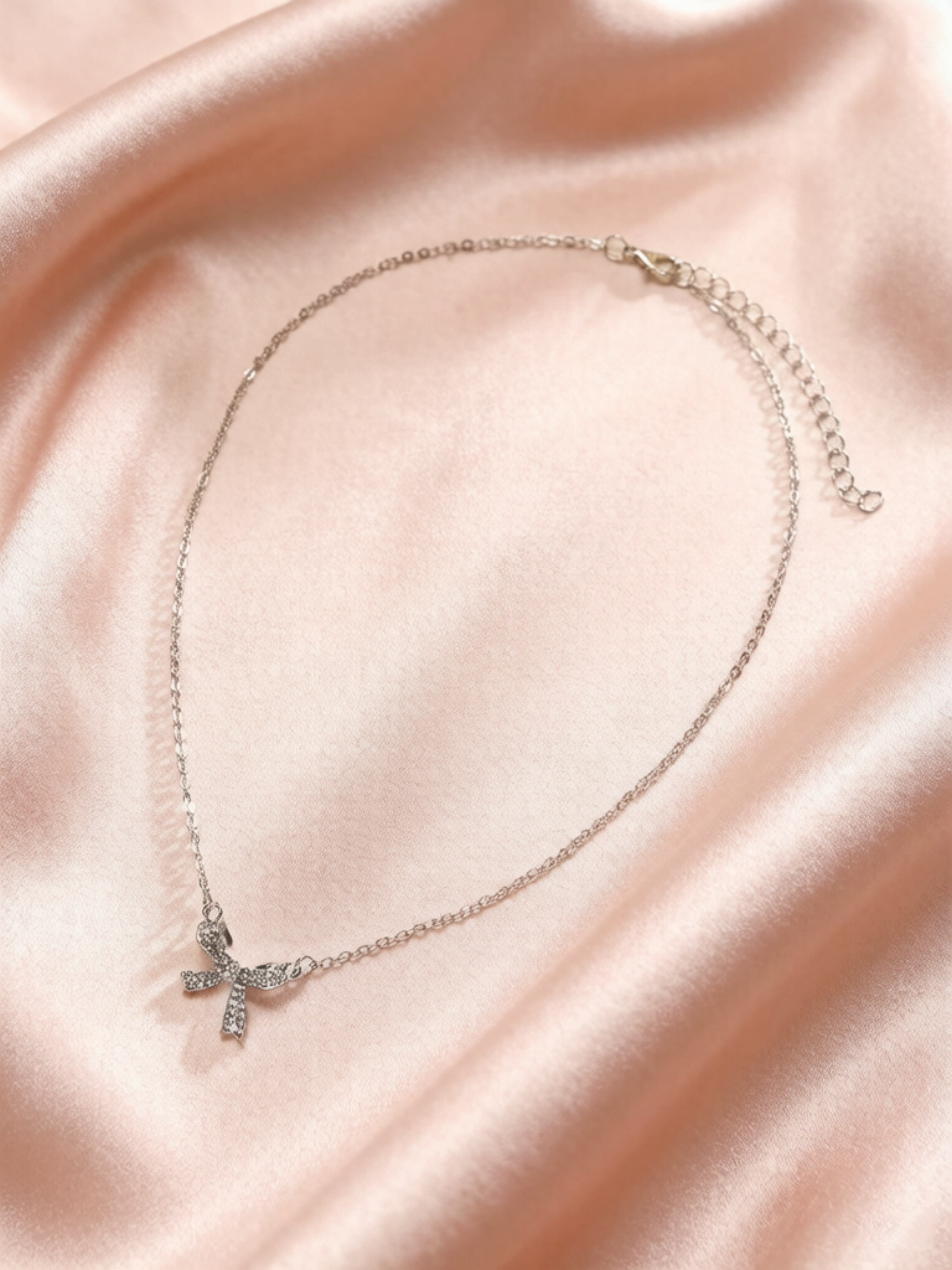 Silver Bow Pendant Necklace