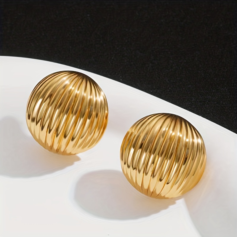 Gold Geometric Stud Earrings for Casual Wear.