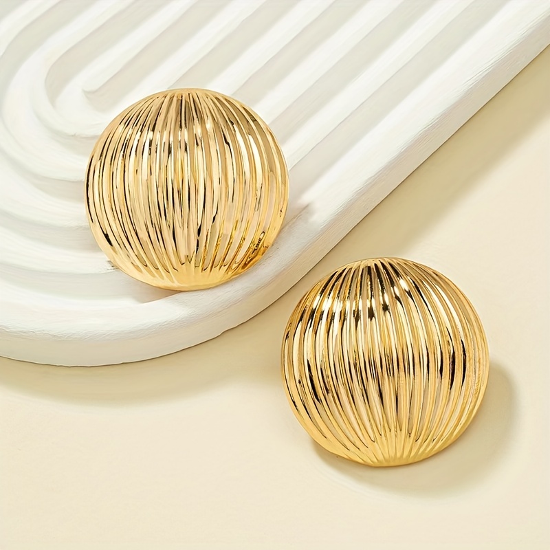 Gold Geometric Stud Earrings for Casual Wear.