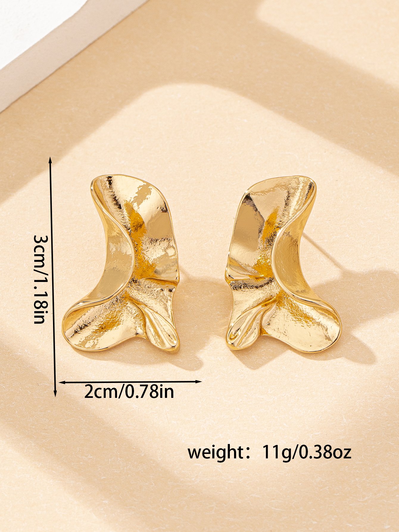 Gold Wavy Dangler Earrings for Casual Wear.