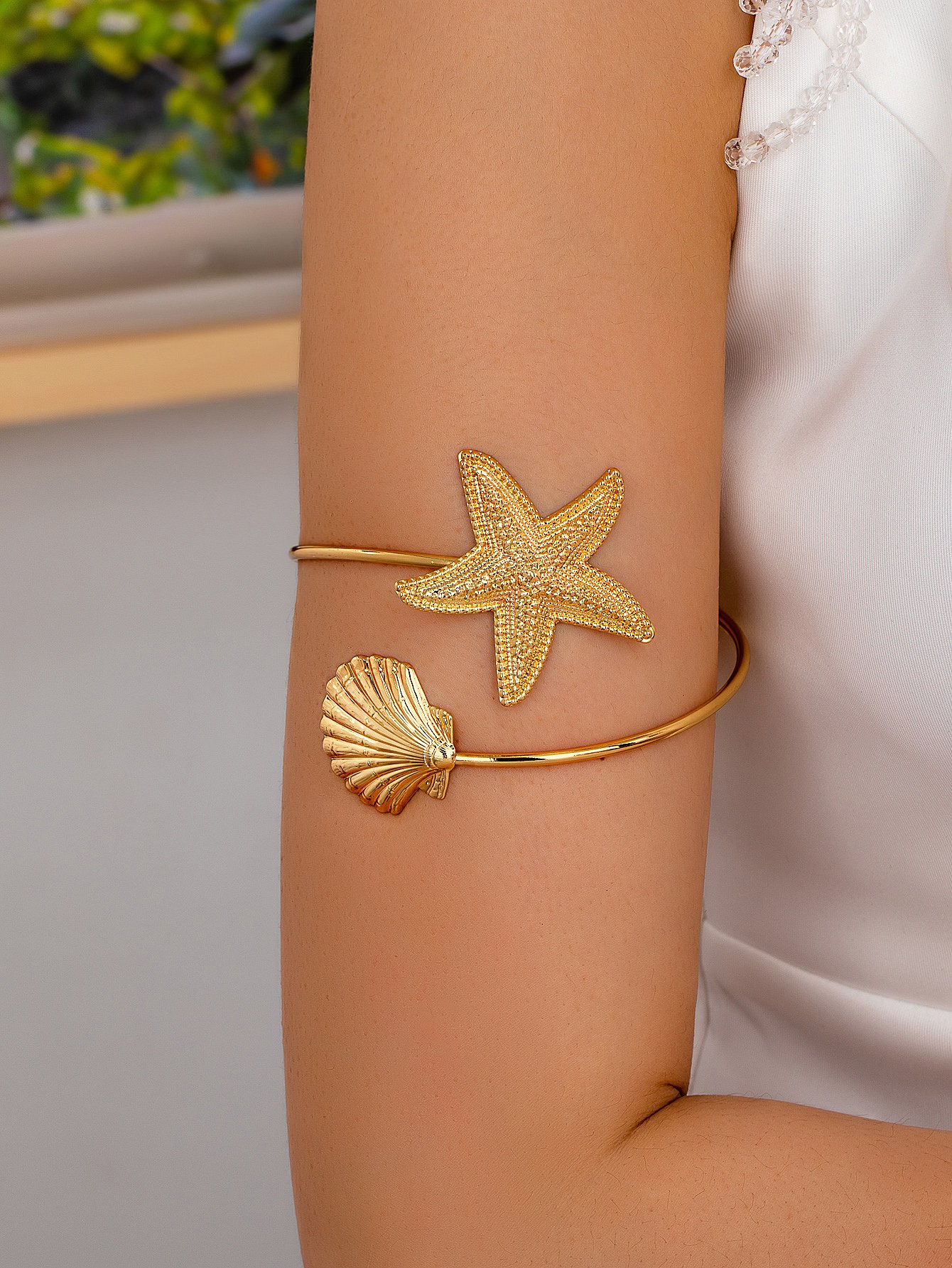 Golden Starfish and Shell Cuff Bracelet for Women.