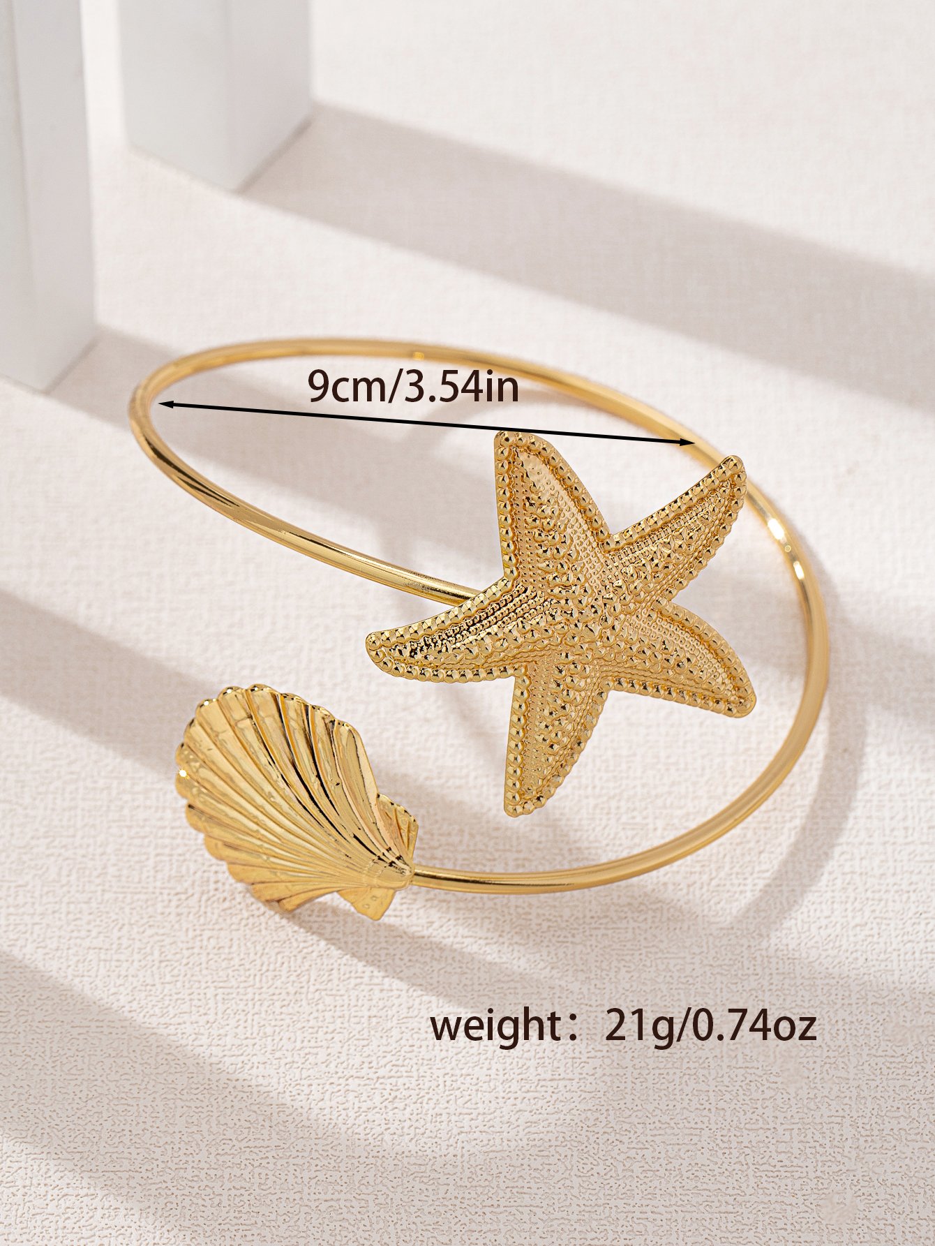 Golden Starfish and Shell Cuff Bracelet for Women.