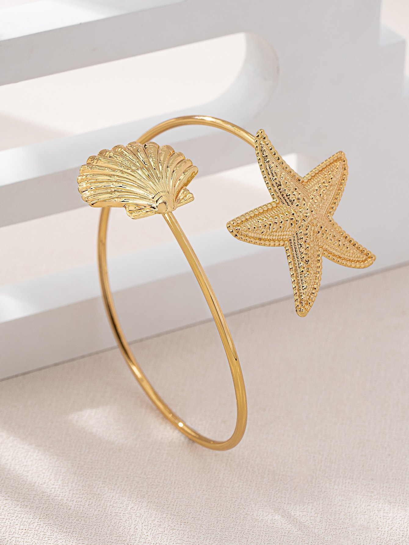 Golden Starfish and Shell Cuff Bracelet for Women.