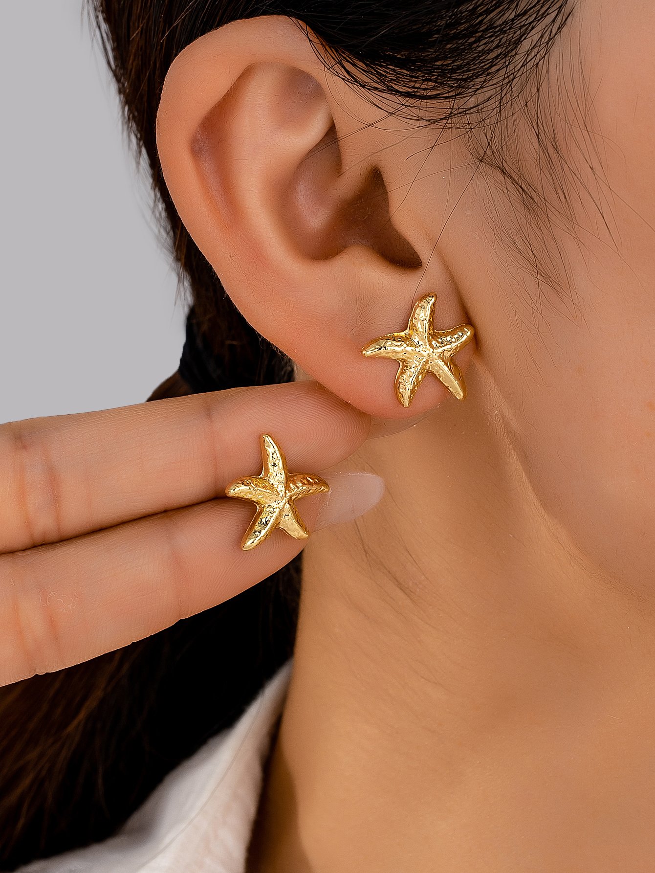 Gold Starfish Stud Earrings for Casual Wear.