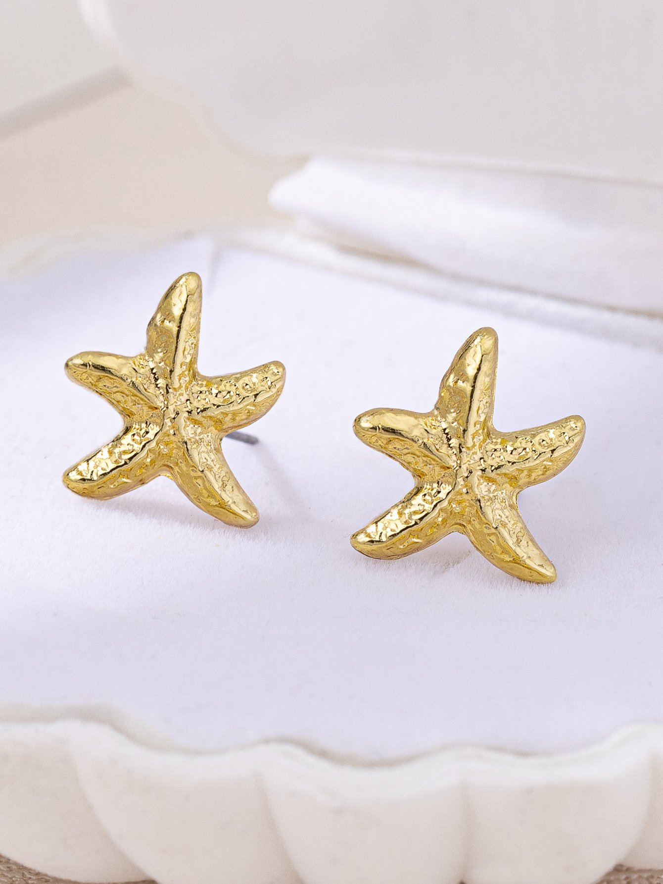 Gold Starfish Stud Earrings for Casual Wear.