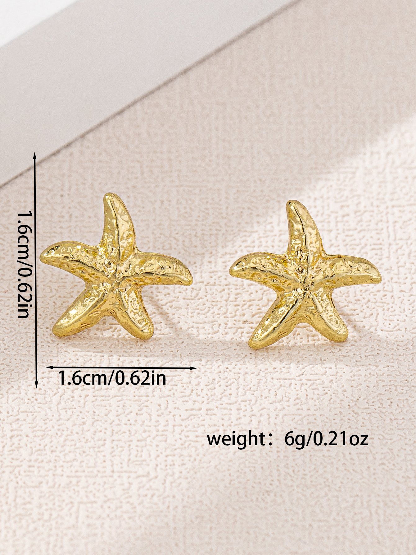 Gold Starfish Stud Earrings for Casual Wear.