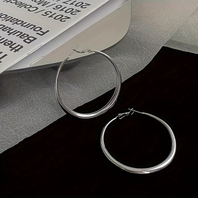 Silver Hoop Dangle Earrings for Everyday Style.