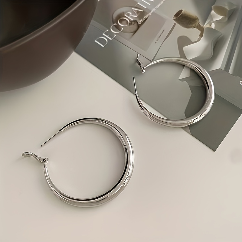 Silver Hoop Dangle Earrings for Everyday Style.