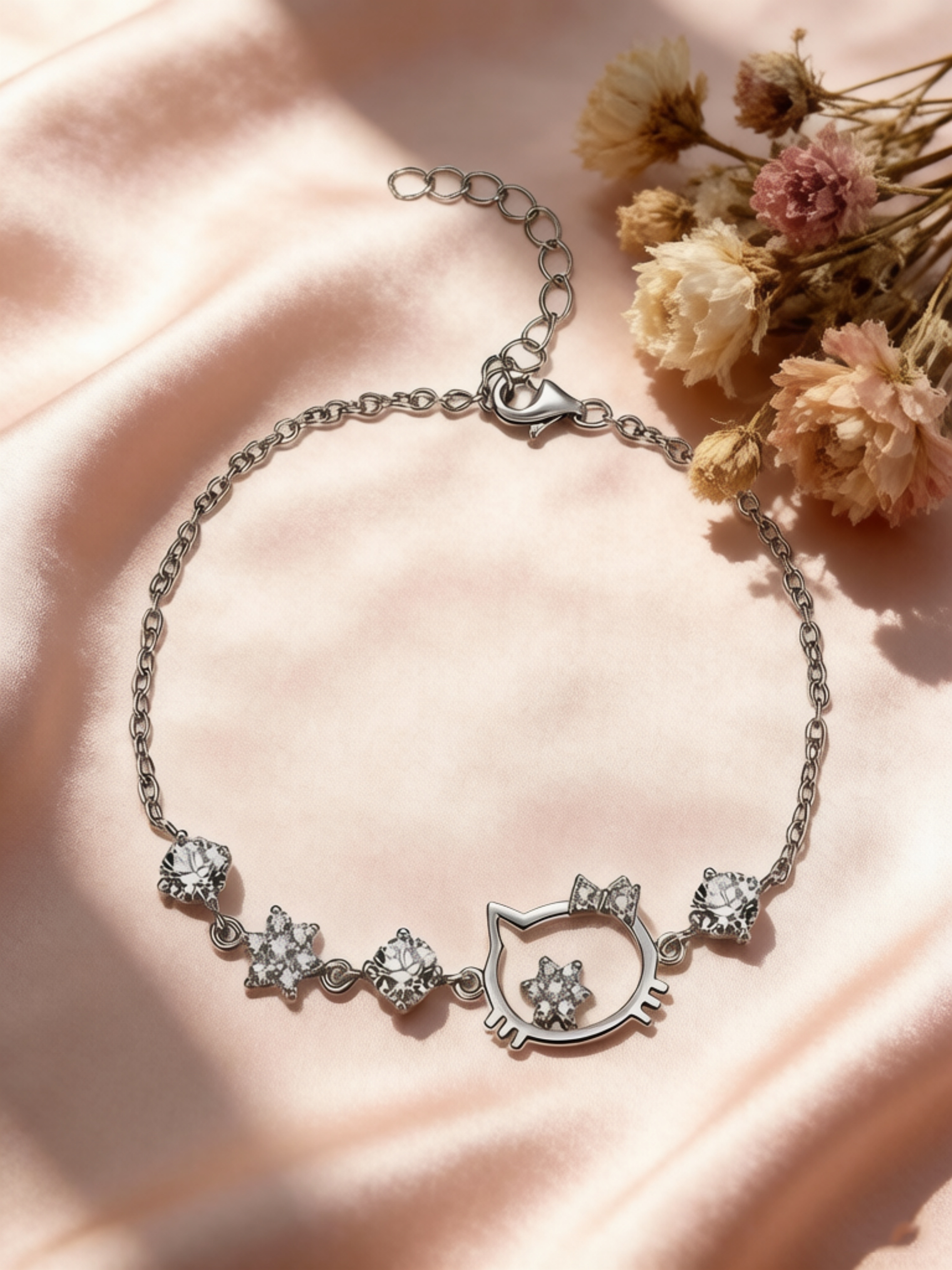 Sparkling Silver Charm Bracelet with Hello Kitty Design.