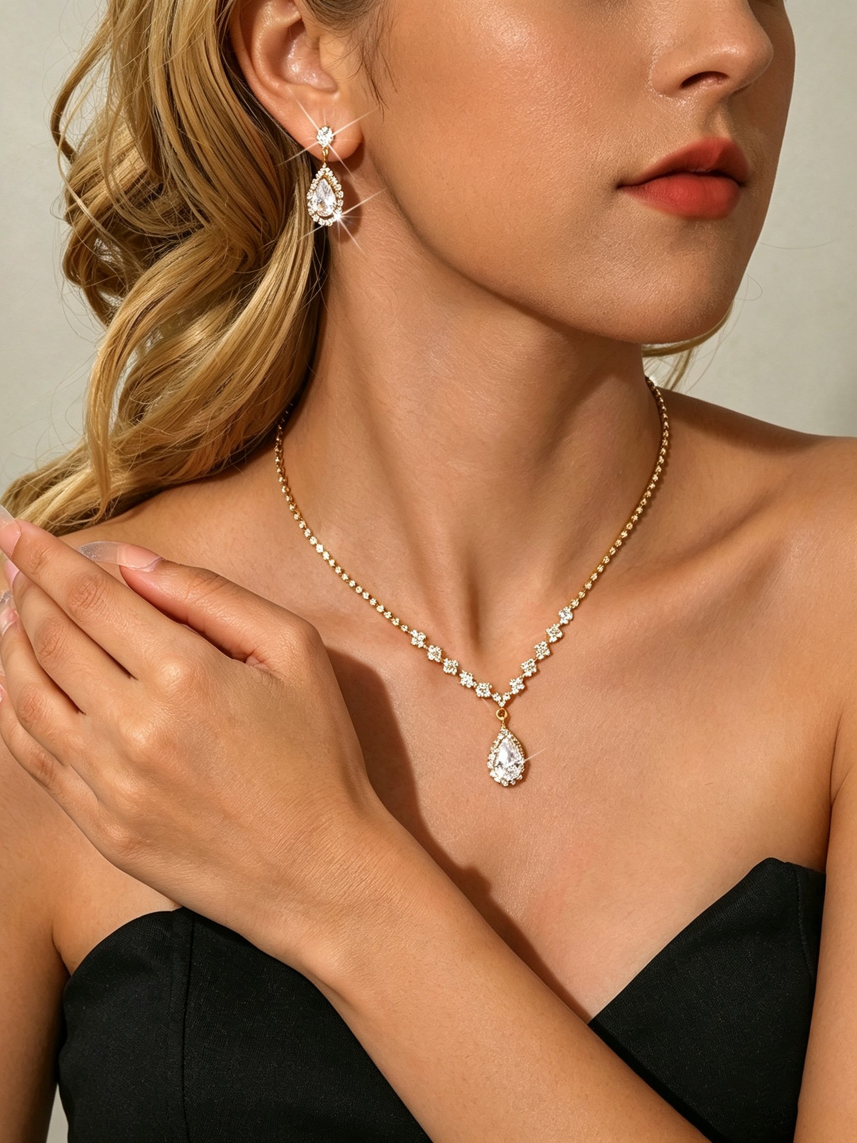 Gold Plated Crystal Teardrop Necklace and Earrings Set for Parties.