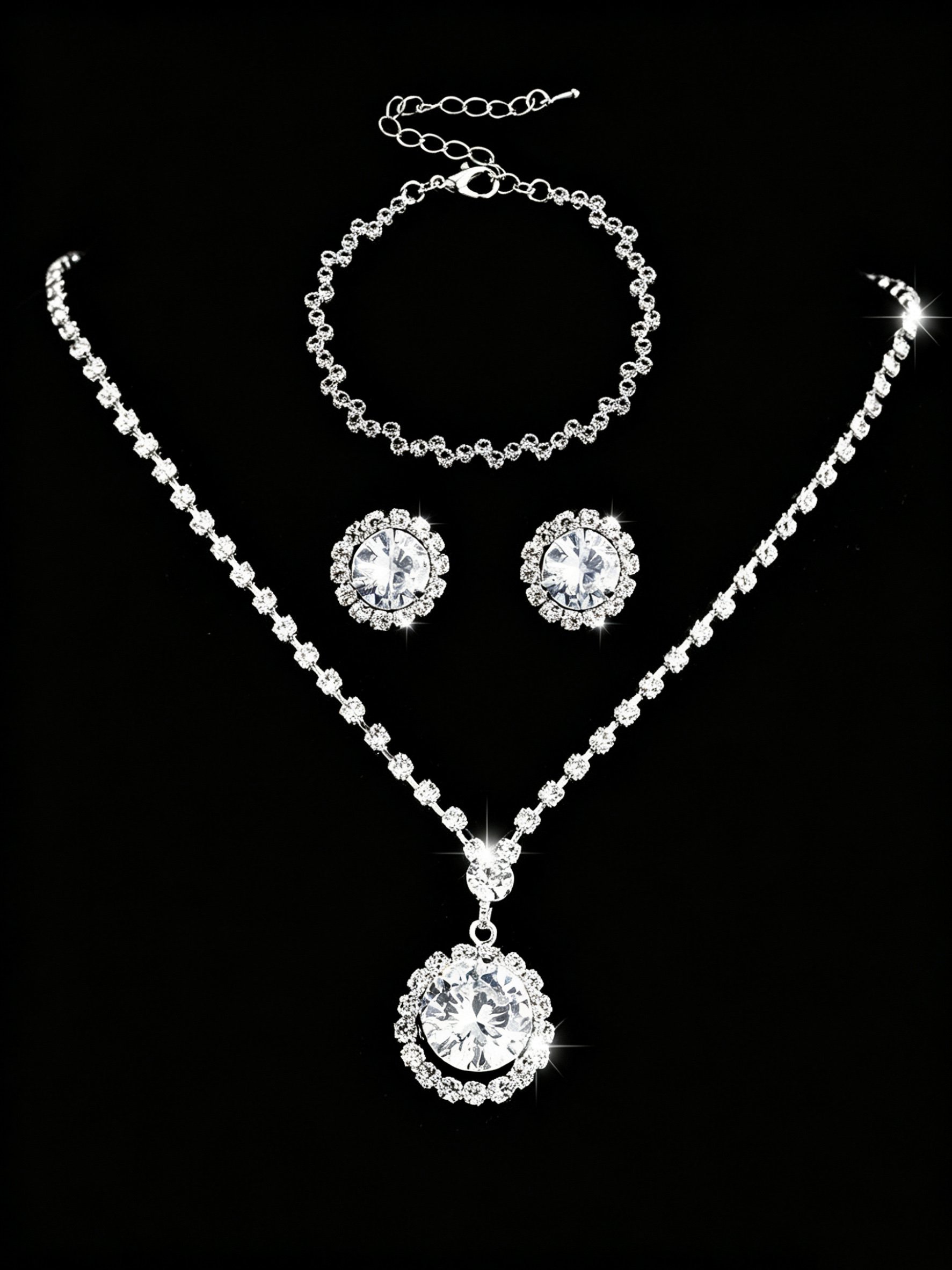 Glamorous Silver Crystal Necklace, Earrings and Bracelet Set for Parties.