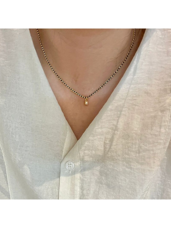 Gold Tone and Black Chain Necklace with Rhinestone Pendant
