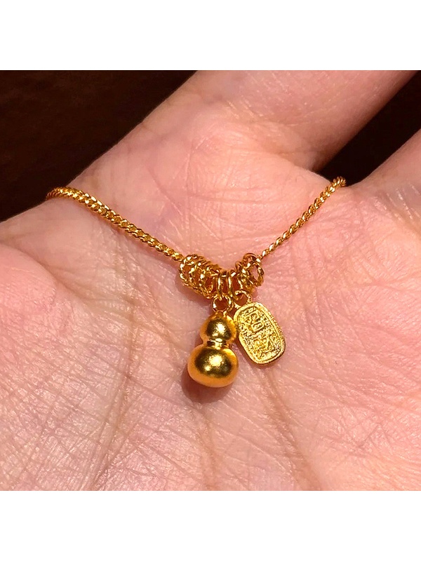 Gold Tone Gourd and Fortune Charm Necklace
