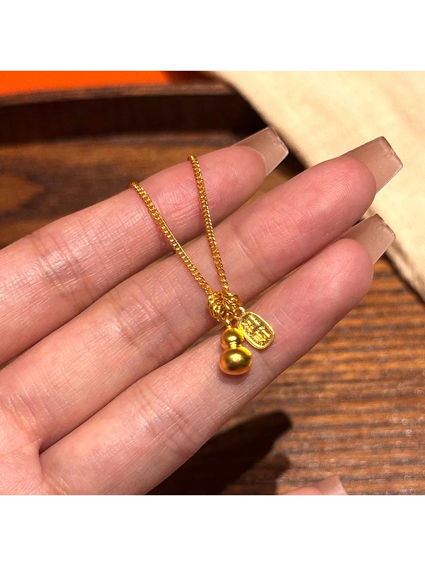 Gold Tone Gourd and Fortune Charm Necklace