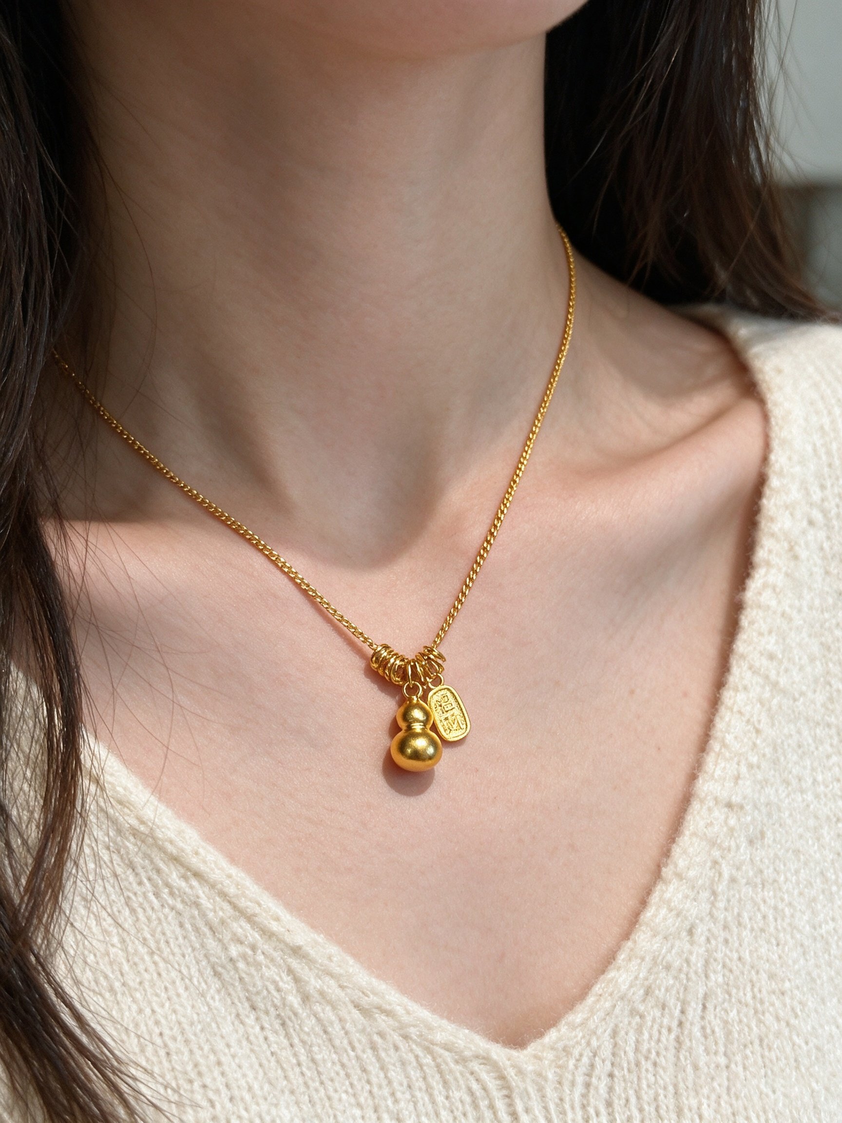 Gold Tone Gourd and Fortune Charm Necklace