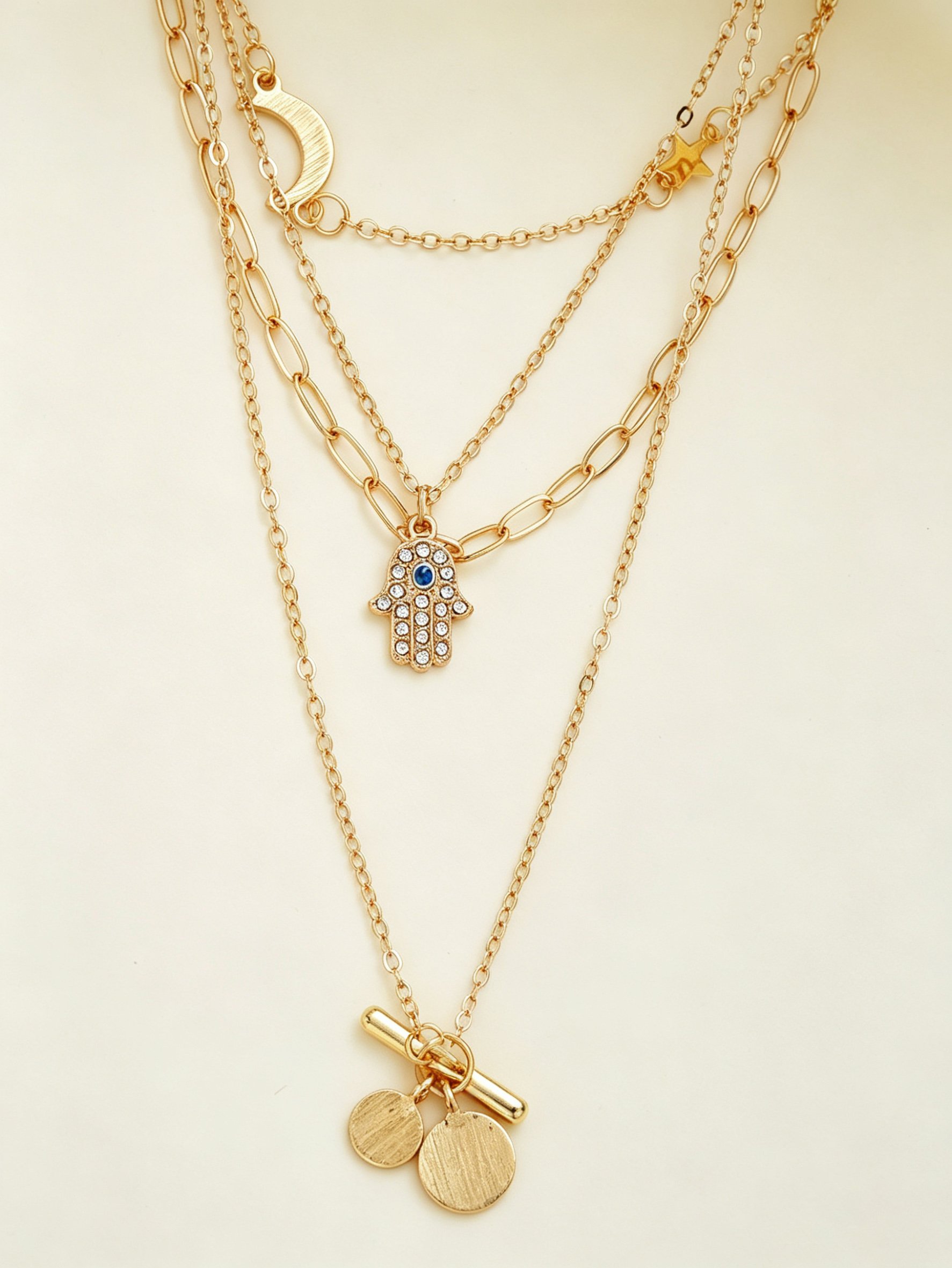 Gold Layered Necklace with Hamsa Hand and Star Charms