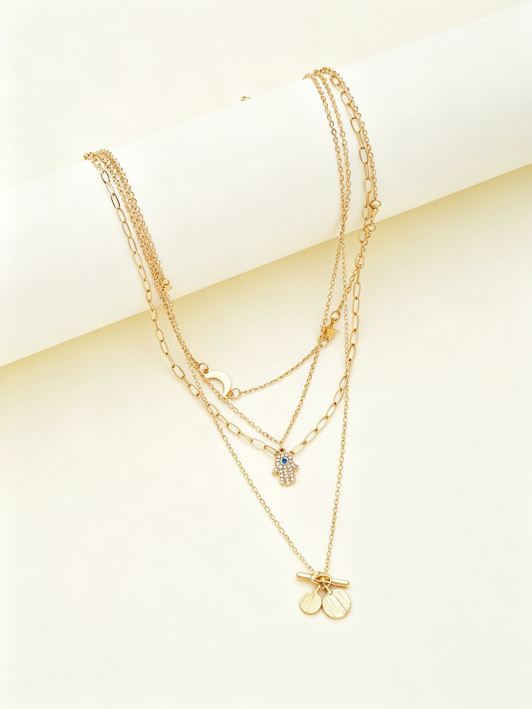 Gold Layered Necklace with Hamsa Hand and Star Charms