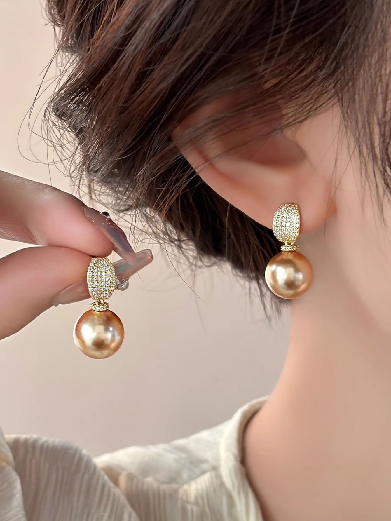 Golden Pearl Stud Earrings with Zircon Accent.