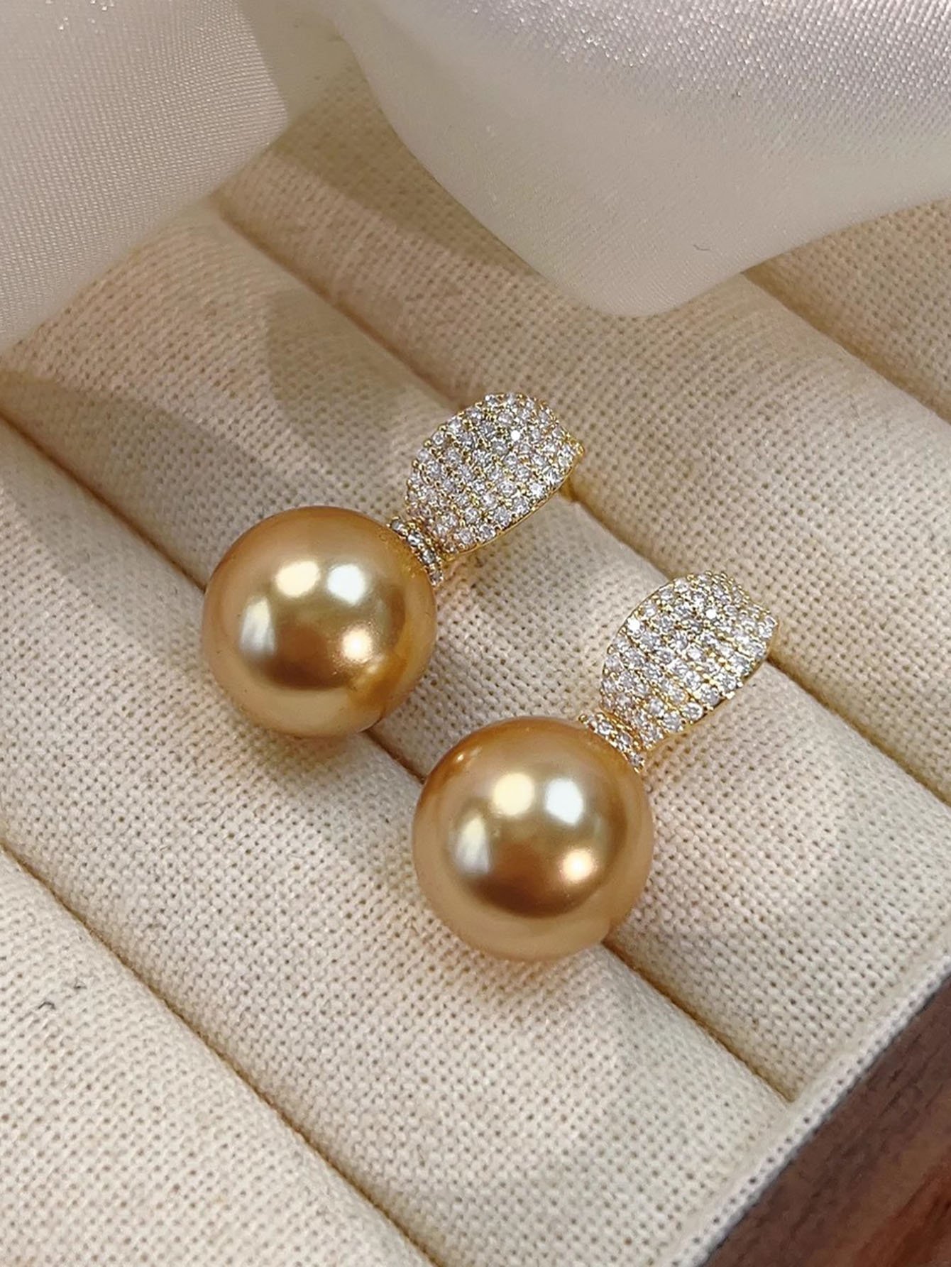Golden Pearl Stud Earrings with Zircon Accent.