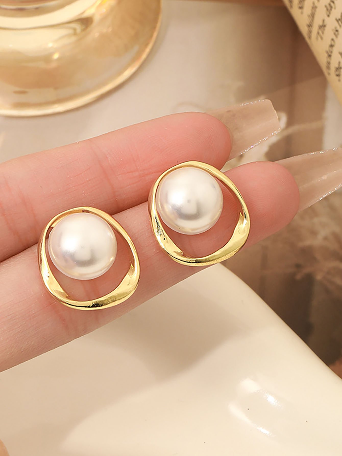 Gold and Pearl Stud Earrings for Women - Casual Wear.