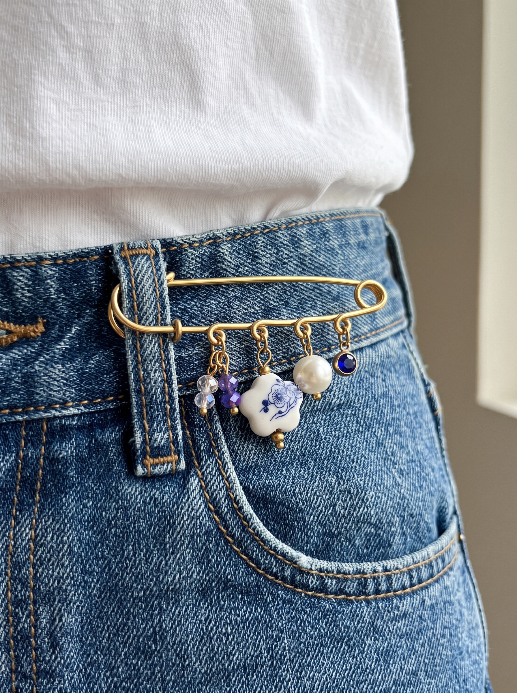 Elegant Gold Plated Brooch with Blue and White Porcelain Charm