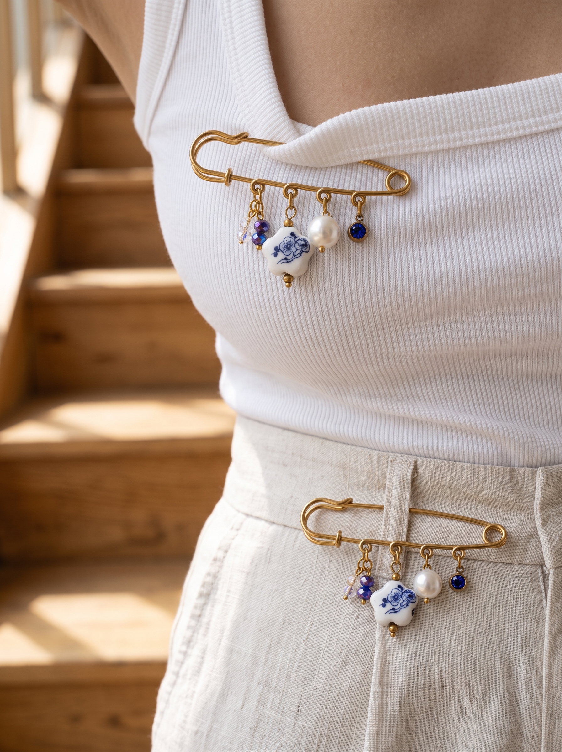 Elegant Gold Plated Brooch with Blue and White Porcelain Charm